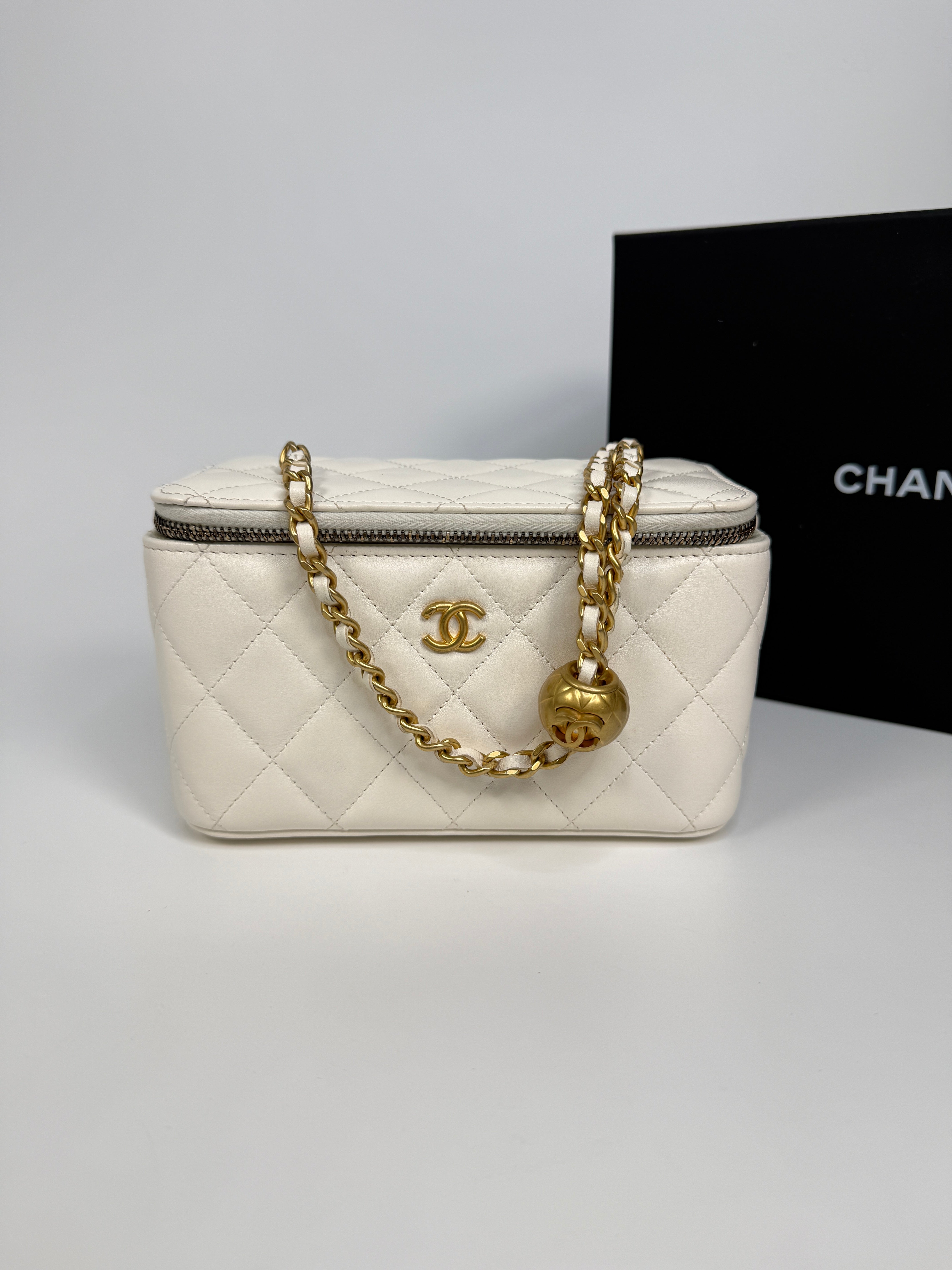 Authentic and preloved Chanel Quilted Pearl Crush Mini Vanity In White Lambskin Leather With Aged Gold Hardware