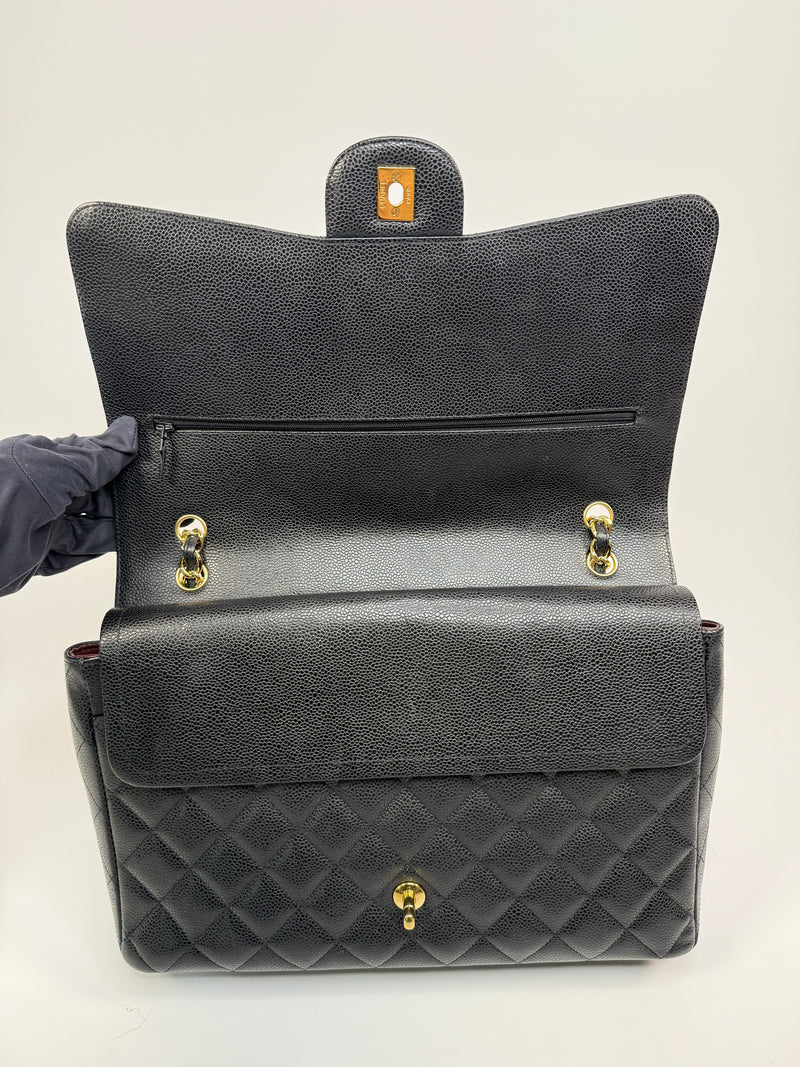 Chanel Maxi Classic Double Flap In Black Caviar Leather With GHW