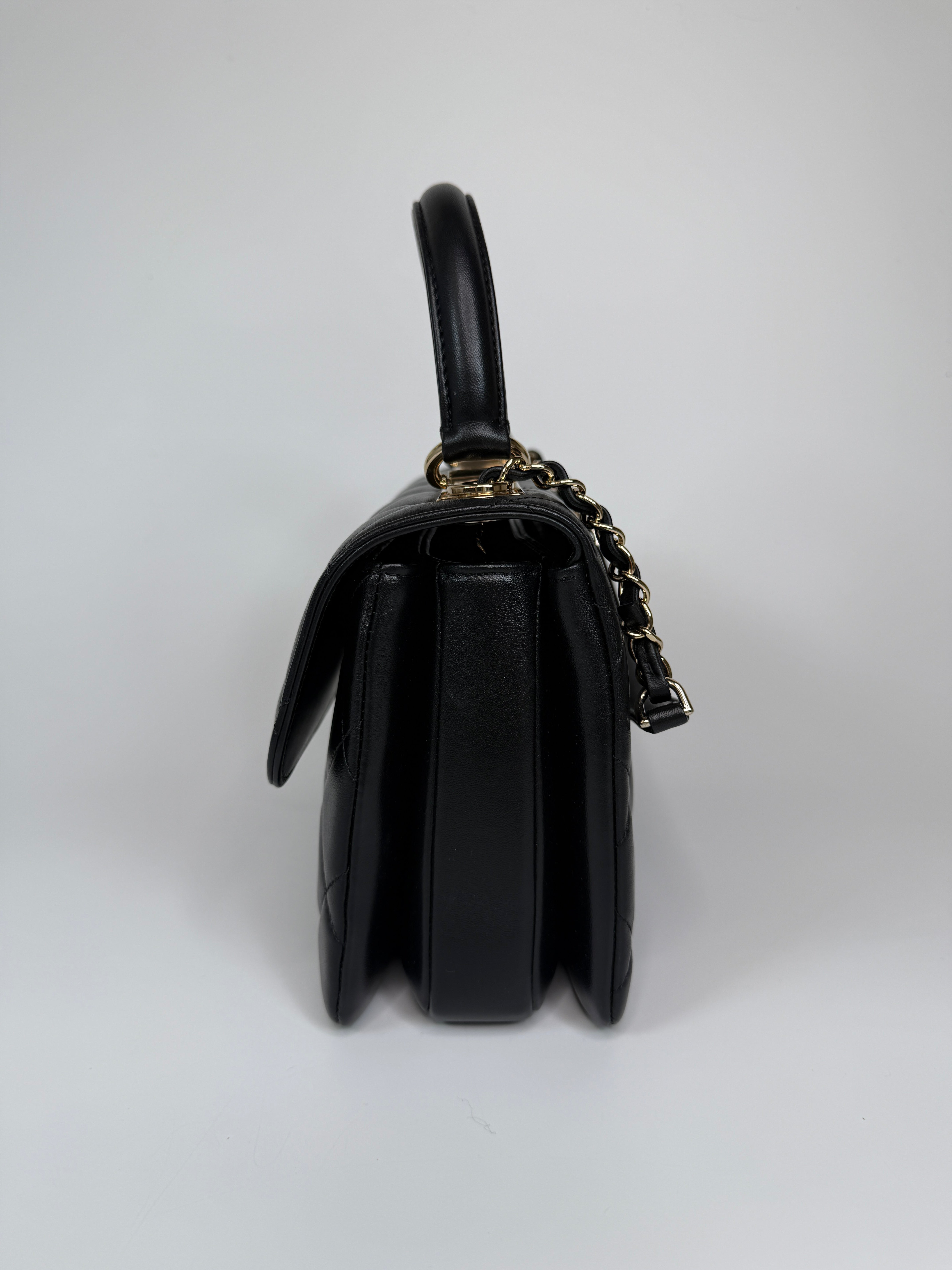 Authentic and preloved Chanel Trendy Top Handle Flap Bag In Black Lambskin With Gold Hardware. Excellent condition. 100% Authenticity guarantee 