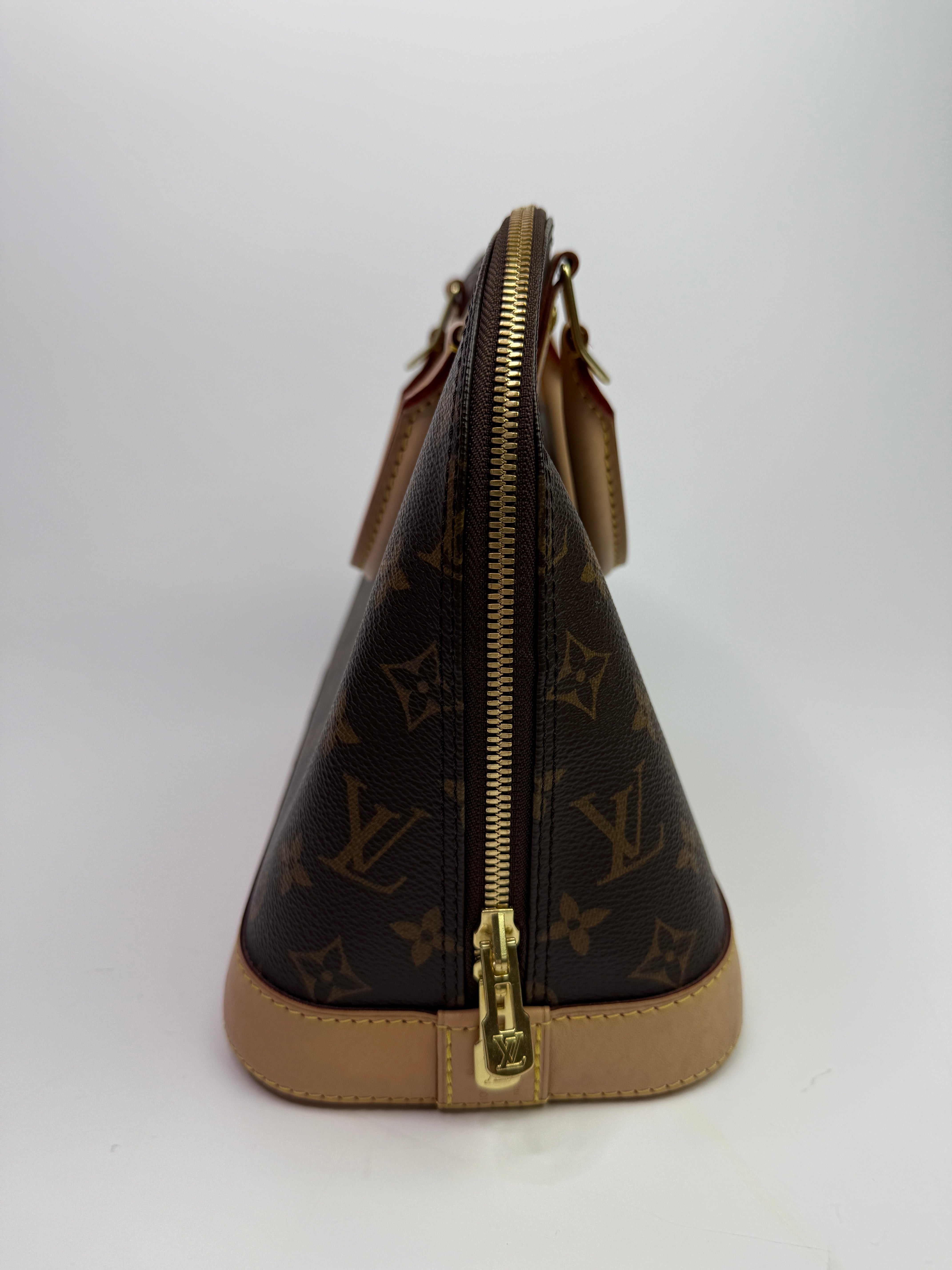 Louis Vuitton Monogram Alma PM Handbag