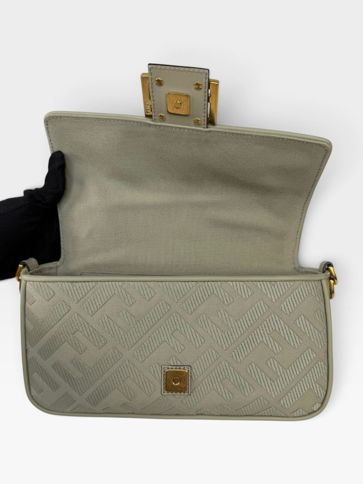 Fendi Baguette In Green Tea FF Monogram Fabric and Canvas With Gold Hardware. 100% authentic and preloved in excellent condition