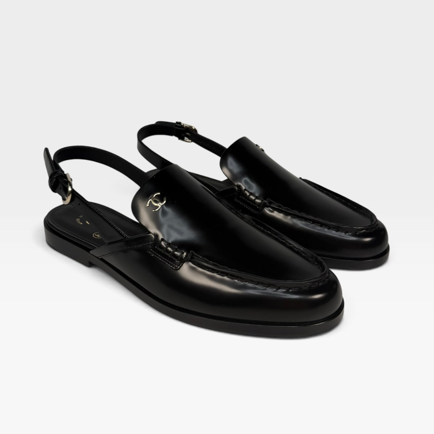 Chanel Spring/Summer Slingback In Black Shiny Calfskin (Size 38.5). Authentic and preloved in new/unused condition. verified by luxe cheshire. insured next day delivery