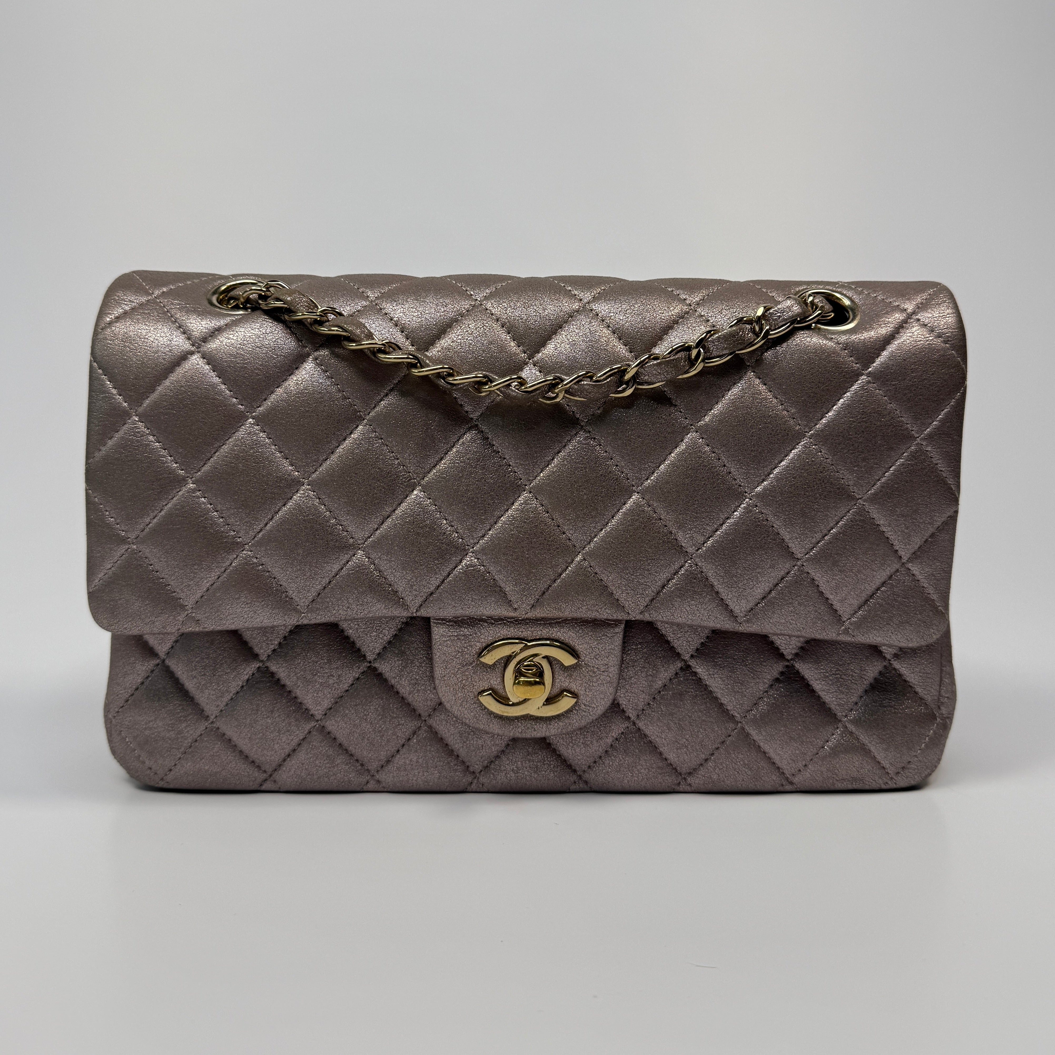 Authentic pre-loved Chanel Iridescent Rose Medium Classic Double Flap With Gold Hardware.