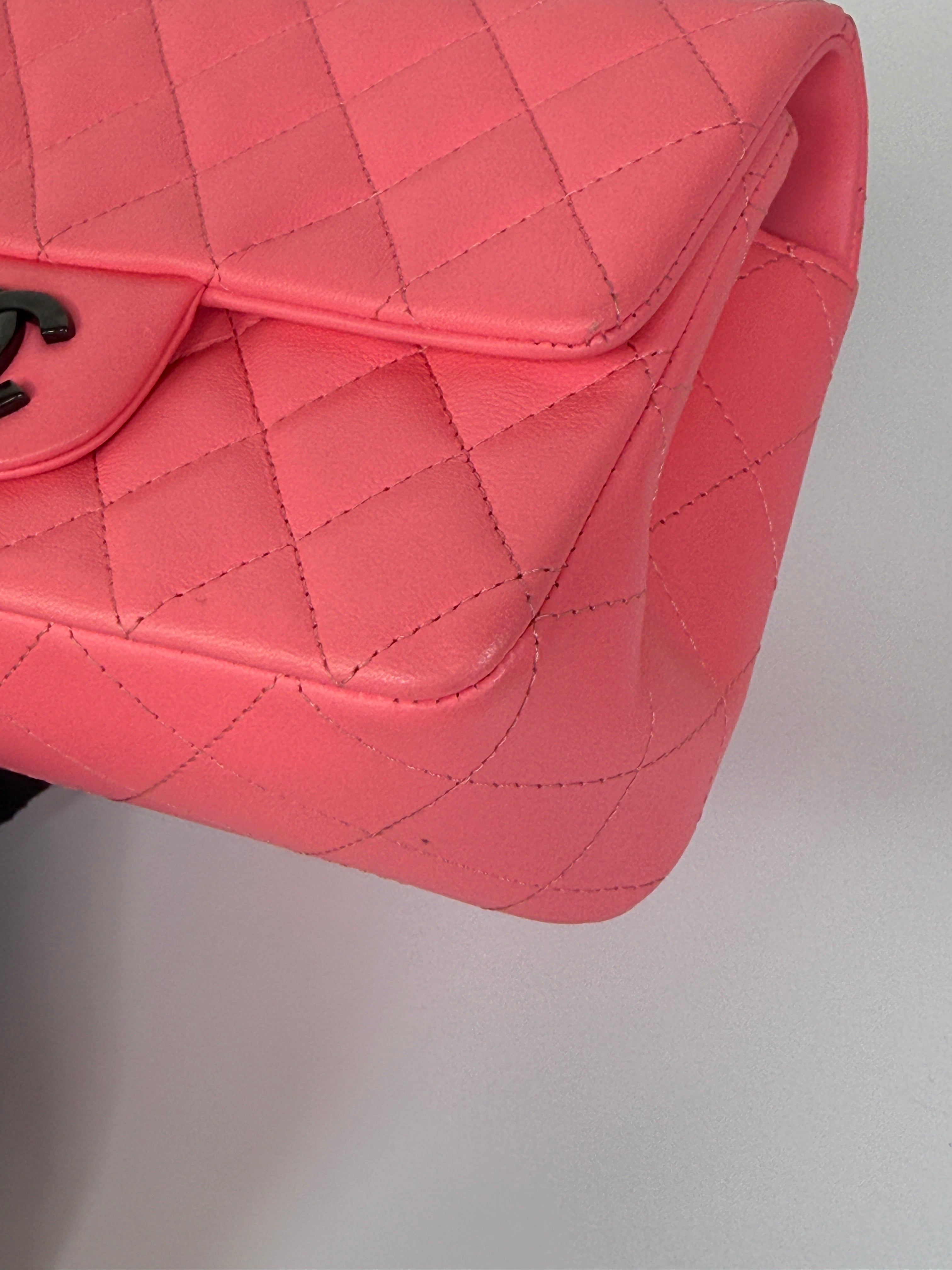 Chanel Mini Rectangle Flap Bag In Pink Lambskin With Black Hardware In Excellent Condition. Authentic and preloved. 