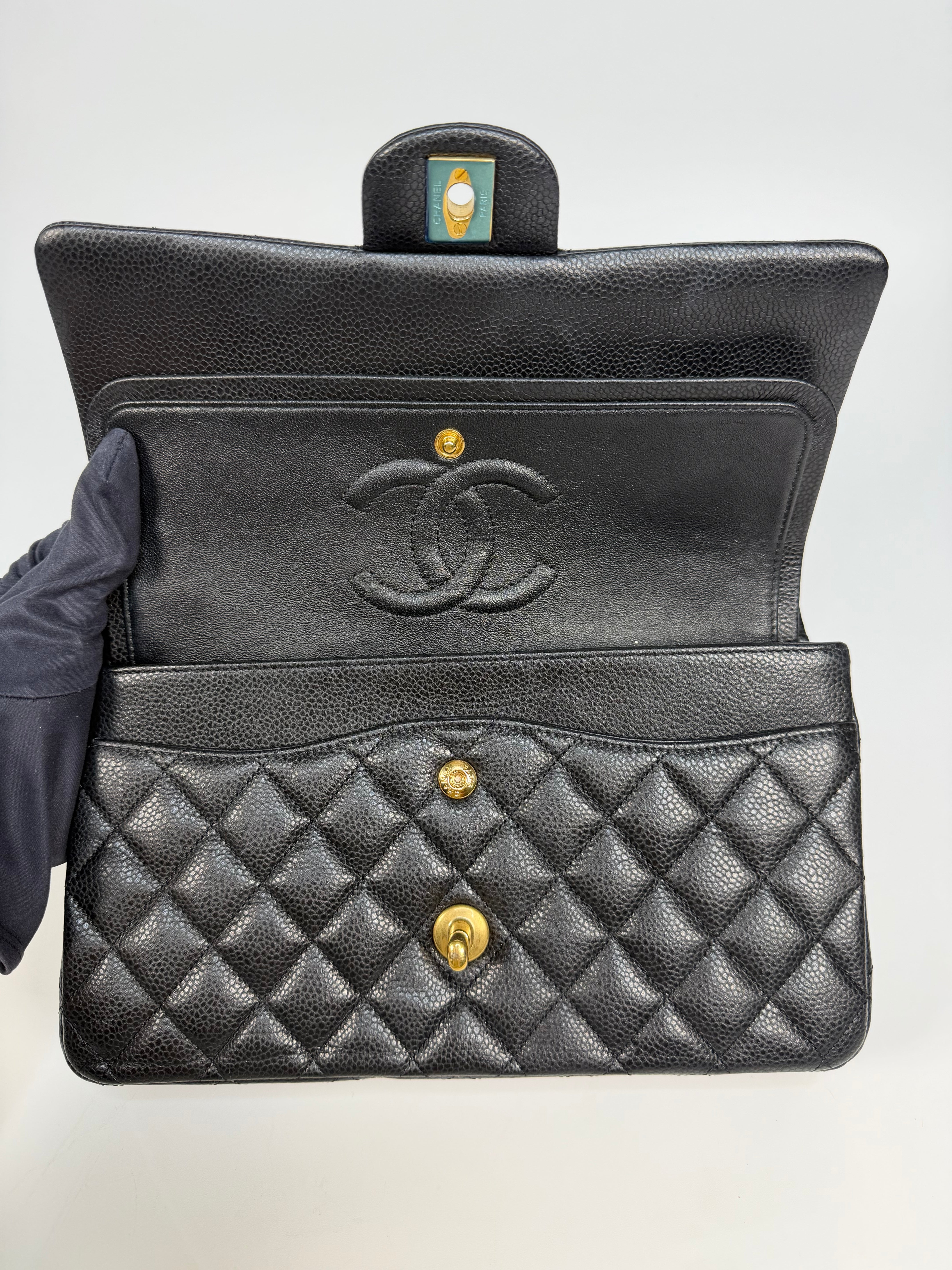 Chanel Medium Classic Double Flap Black Caviar Leather With Gold Hardware. Authentic and preloved in excellent condition