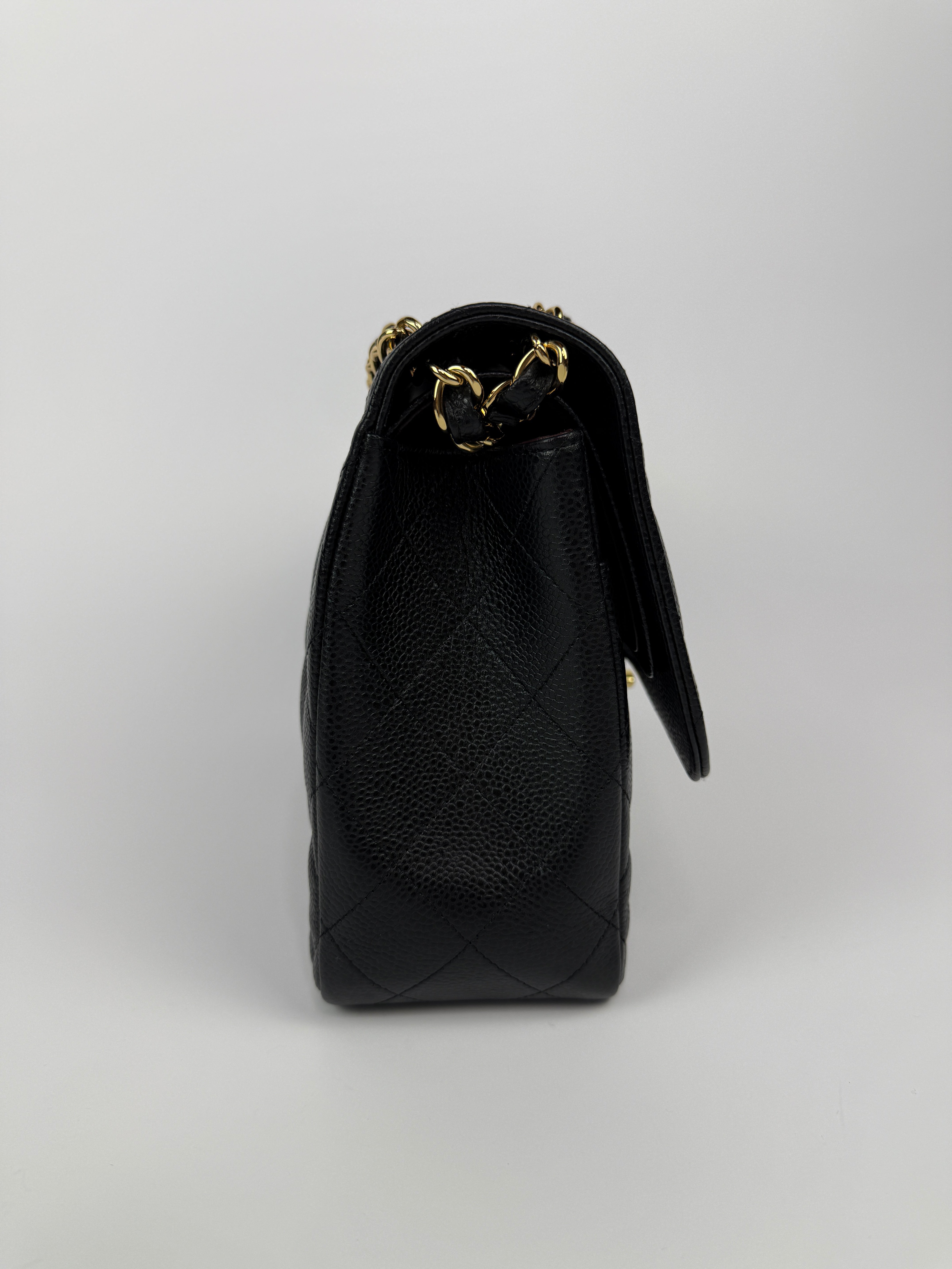 Chanel Jumbo Classic Double Flap In Black Caviar Gold Hardware
Pre Loved & Authentic 