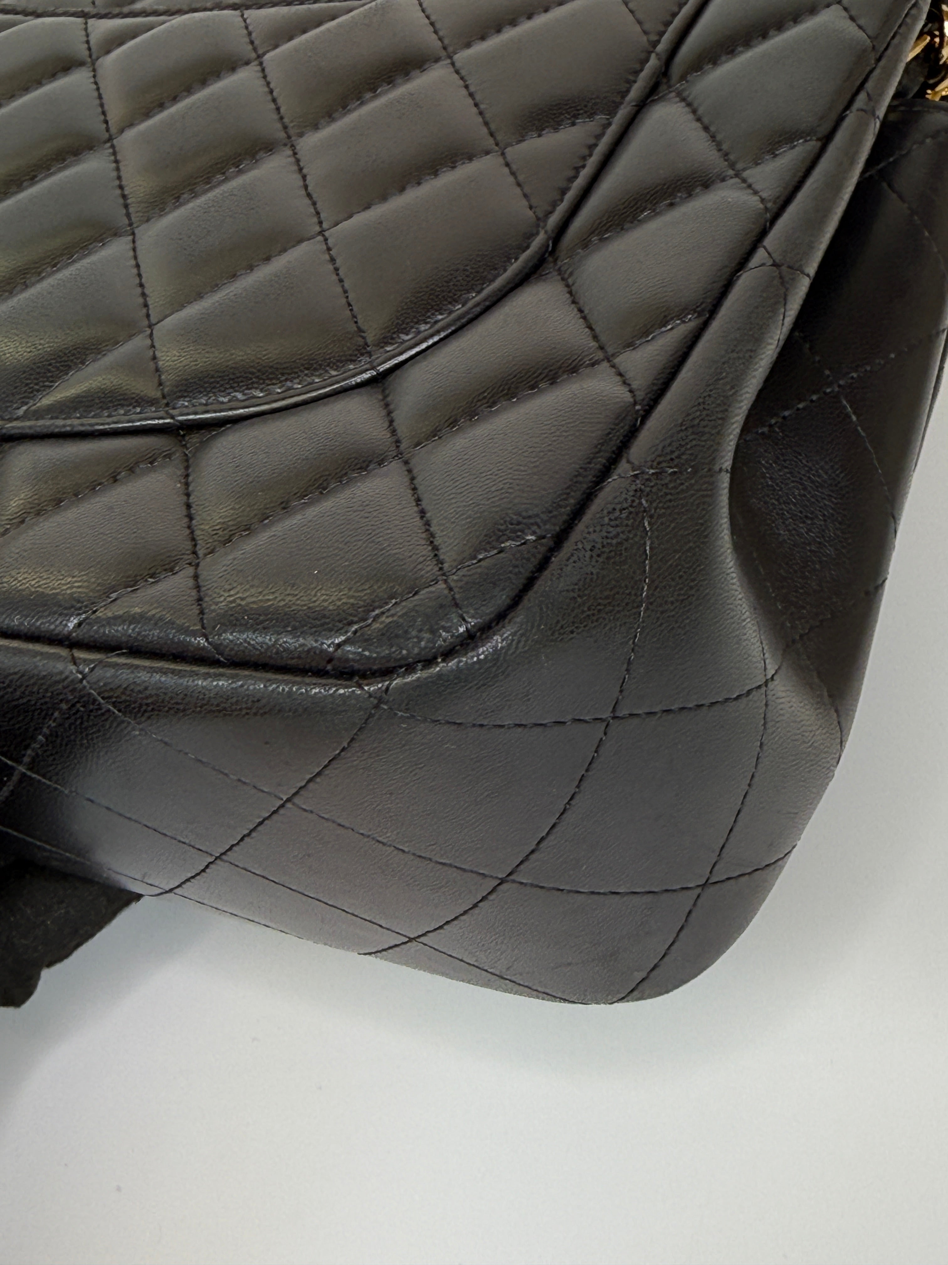 Authentic and preloved Chanel Jumbo Classic Flap Bag In Black Lambskin Leather With GOLD Hardware. Excellent condition. 100% Authenticity Guarantee 