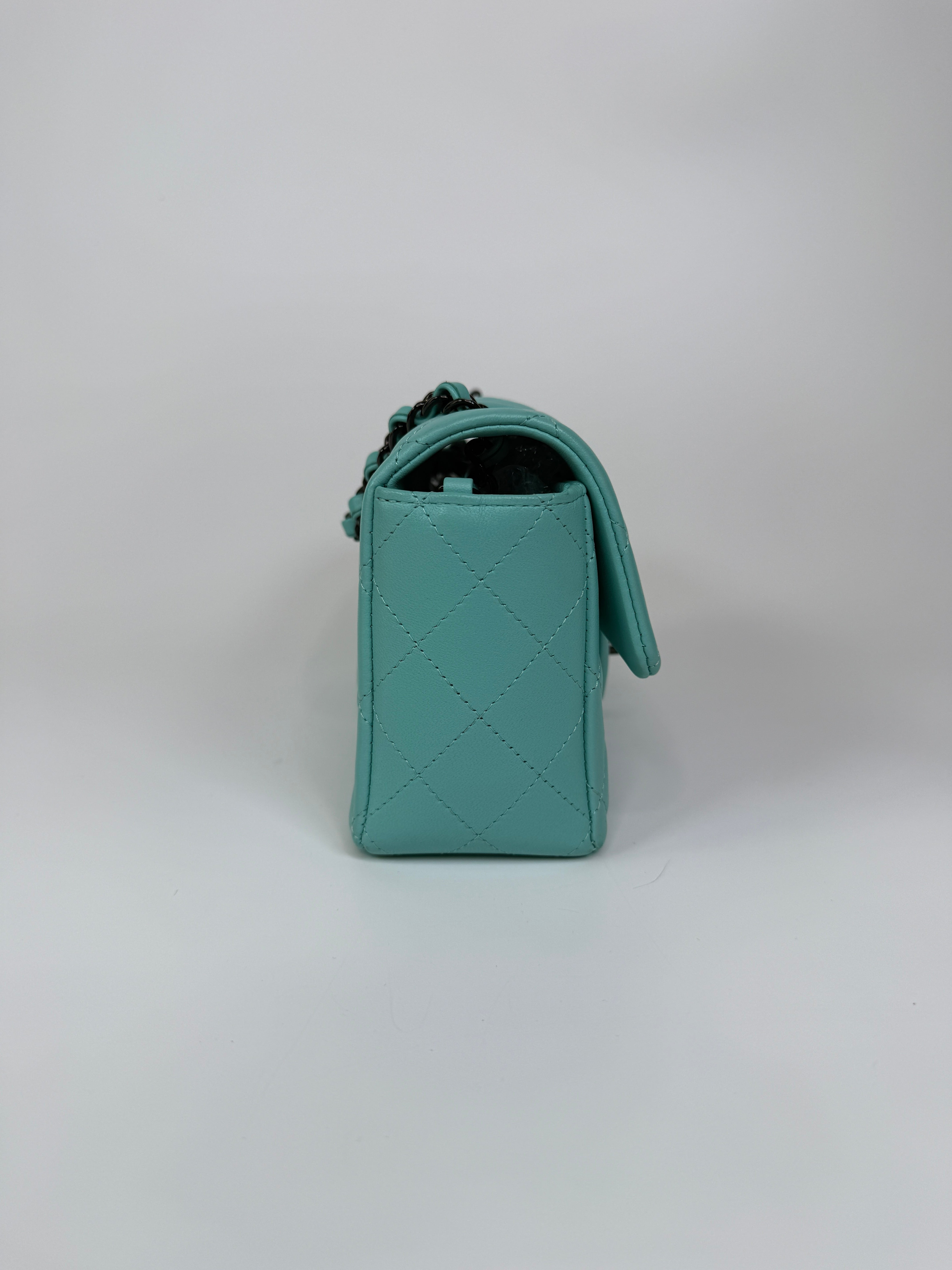 Authentic and preloved Chanel Mini Rectangle Flap Bag In Turquoise Lambskin Leather With Gunmetal Hardware In Excellent condition. Verified by Luxe Cheshire. 100% Authenticity Guarantee. 