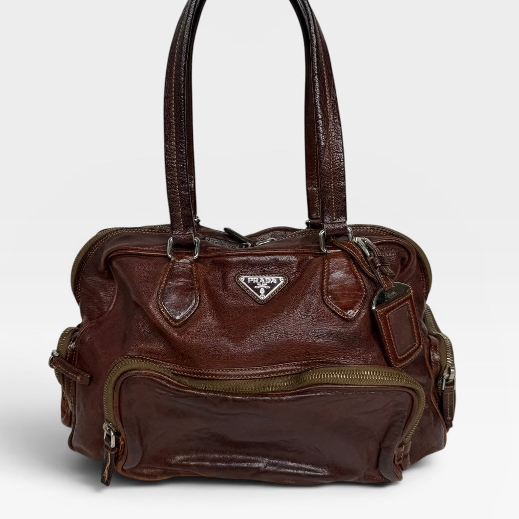 Prada Washed Bauletto Shoulder Bag In Brown Leather With Gold Hardware. Authentic and preloved in very good condition