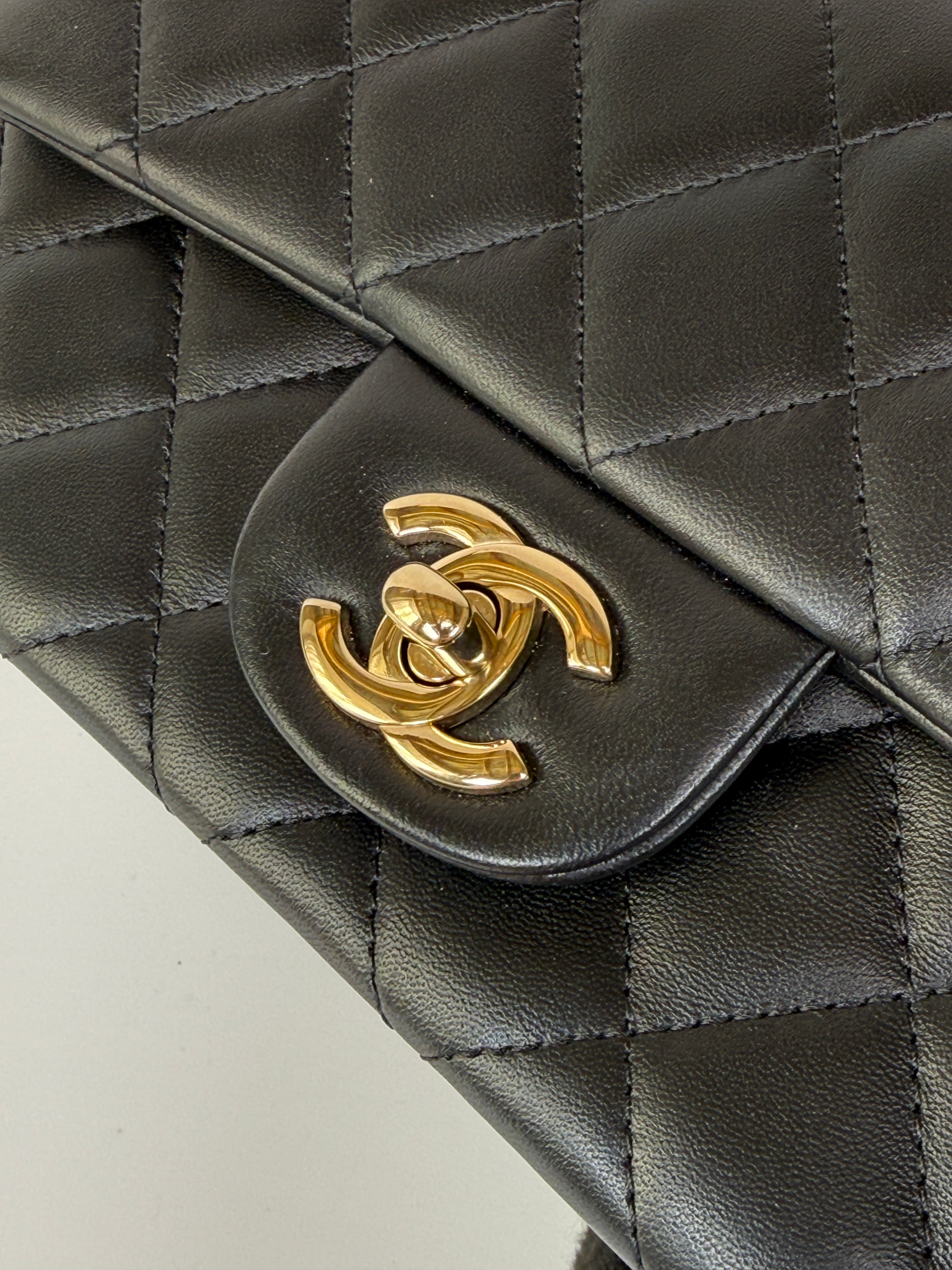 Authentic and preloved Chanel Mini Rectangle Flap Bag In Black Lambskin Leather With Pale Gold Hardware. Excellent condition. 100% Authenticity guarantee 