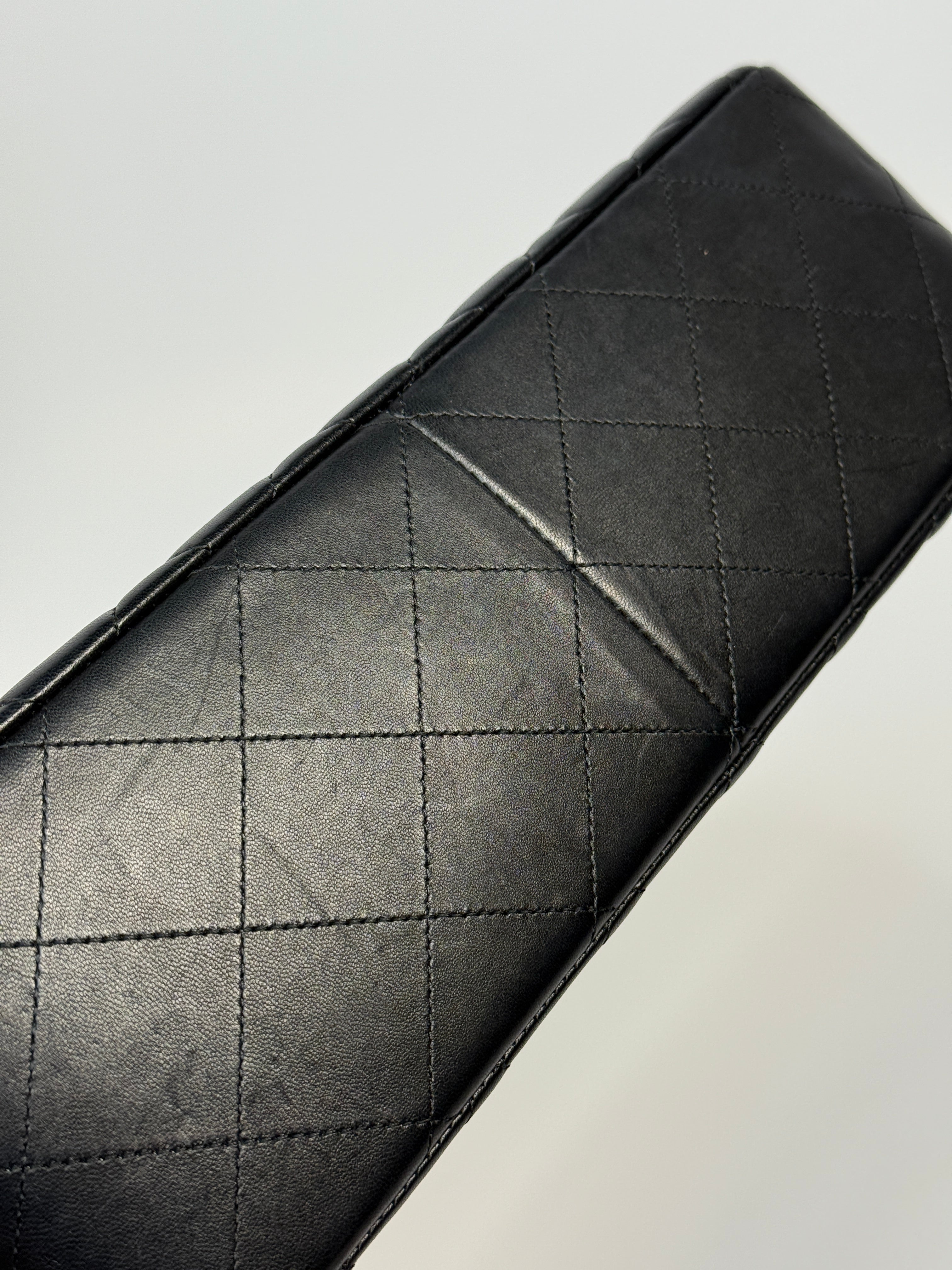 Chanel Jumbo Classic Flap Bag In Black Lambskin Leather With Gold Hardware
Pre Loved & Authentic