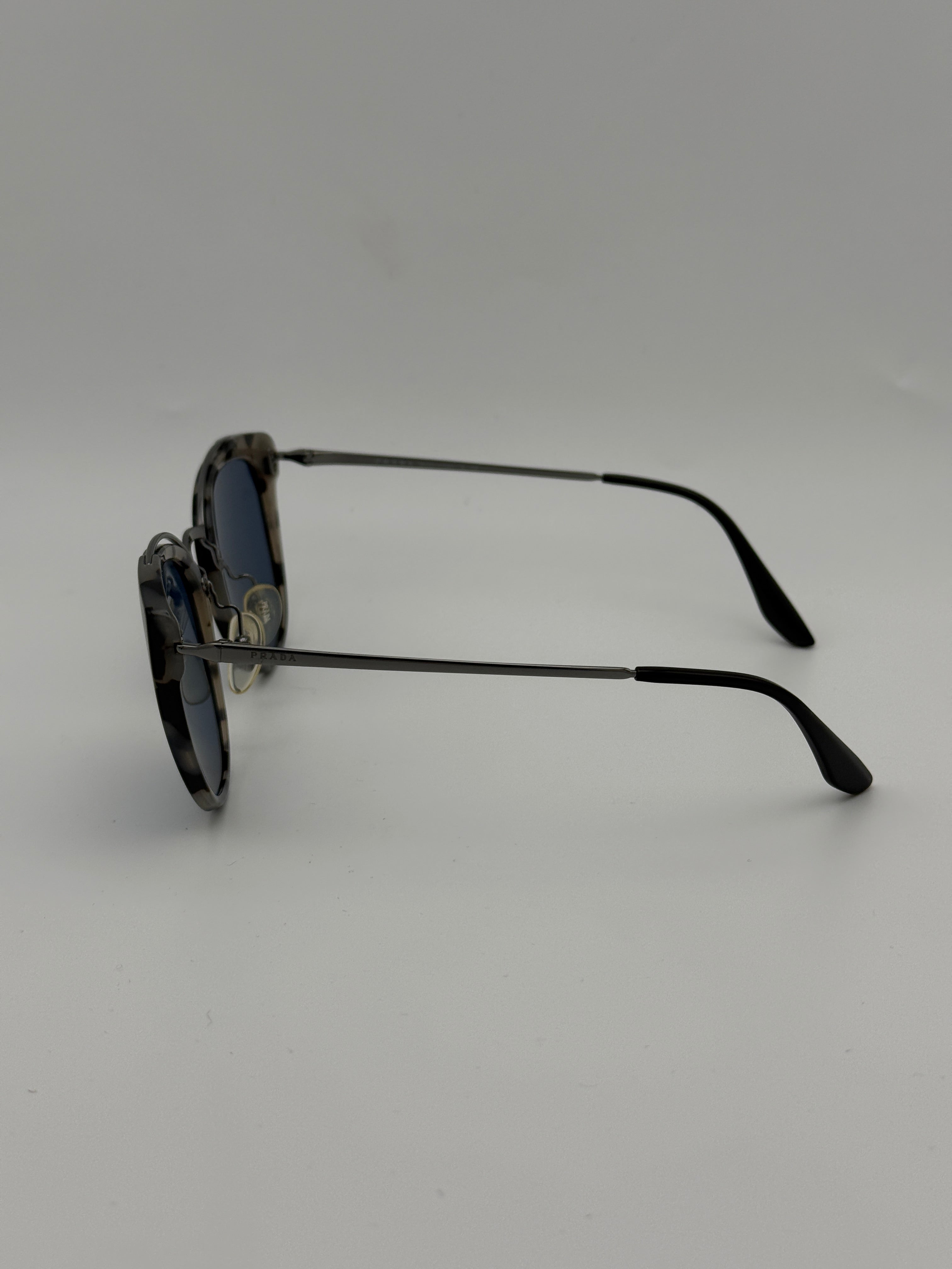 Prada SPR 20U sunglasses. 100% Authenticity guarantee. verified by Luxe Cheshire  
