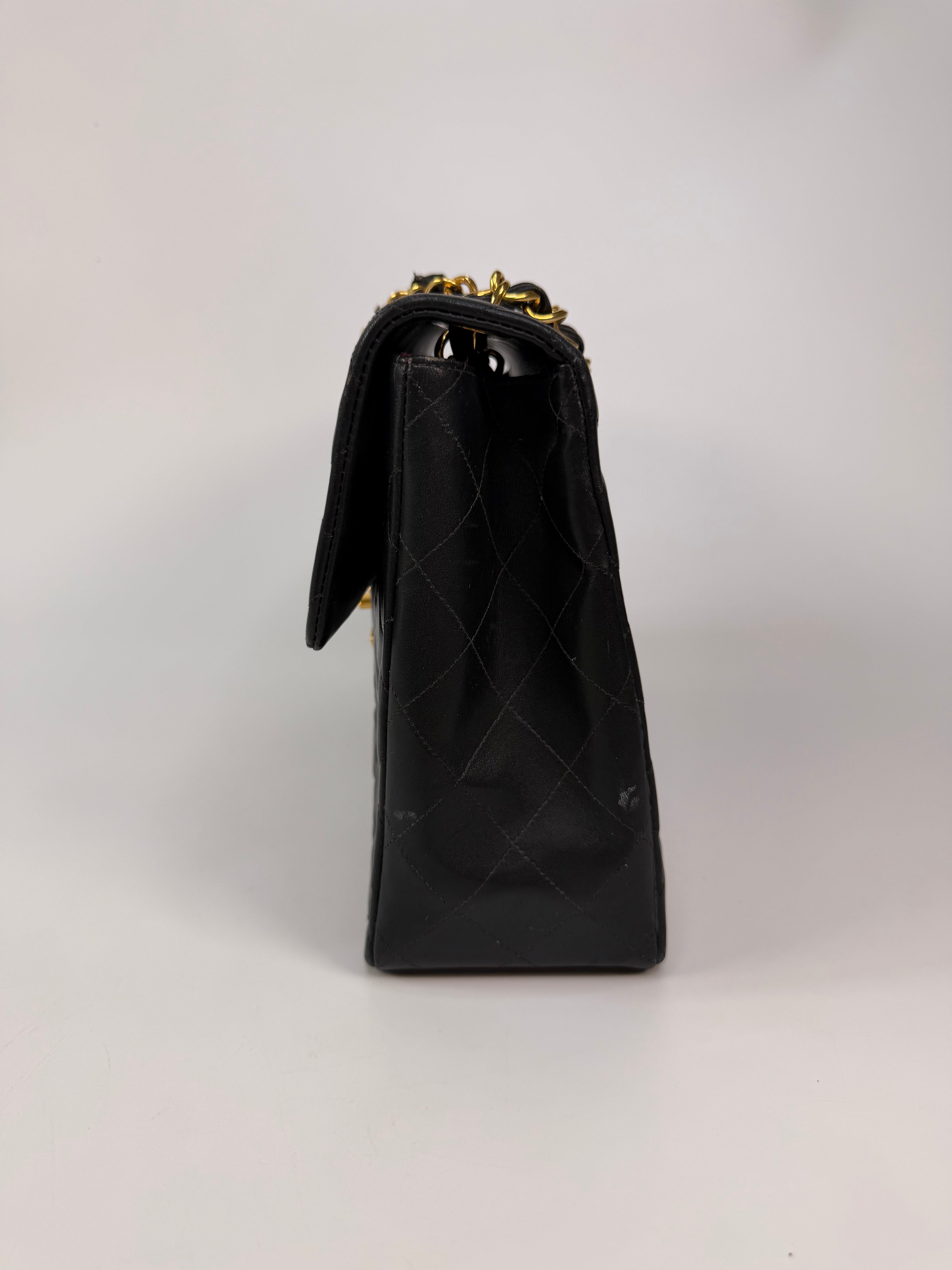 Chanel Vintage XL Maxi Flap Bag In Black Lambskin Gold Hardware. 100% authentic and preloved in excellent condition