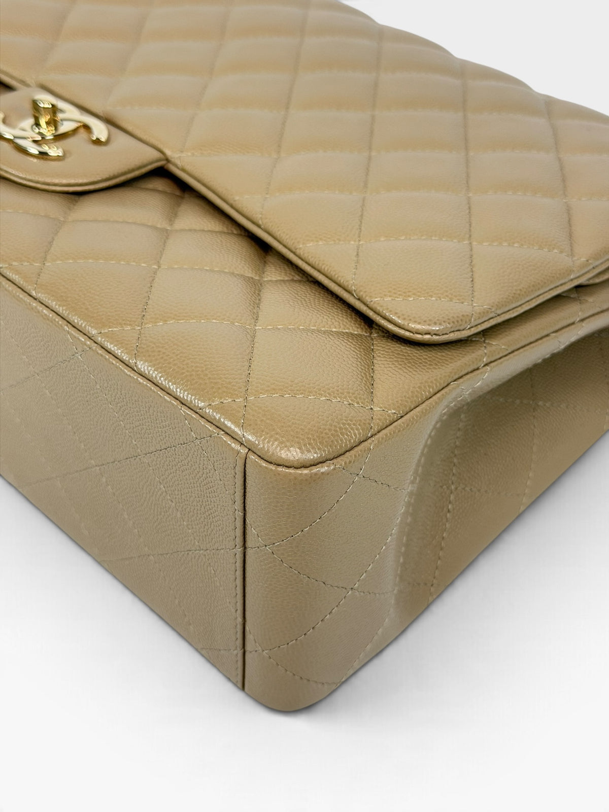 Chanel Maxi Flap In Beige Caviar Leather With Gold Hardware. 100% authentic and pre loved in excellent condition. 