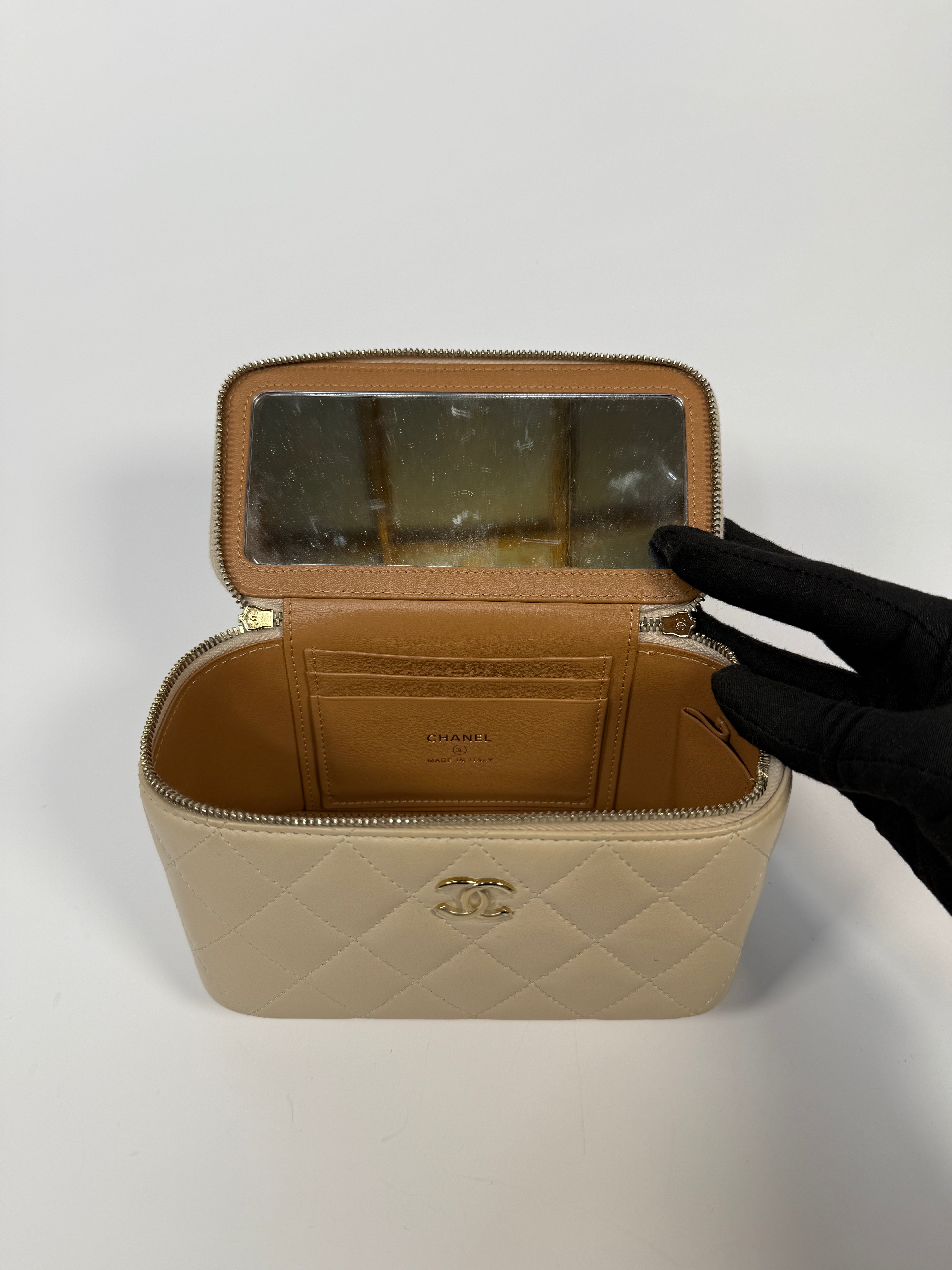 Chanel Vanity Rectangular Top Handle Ecru/Beige Lambskin With Gold Hardware Authentic and preloved. Excellent condition.