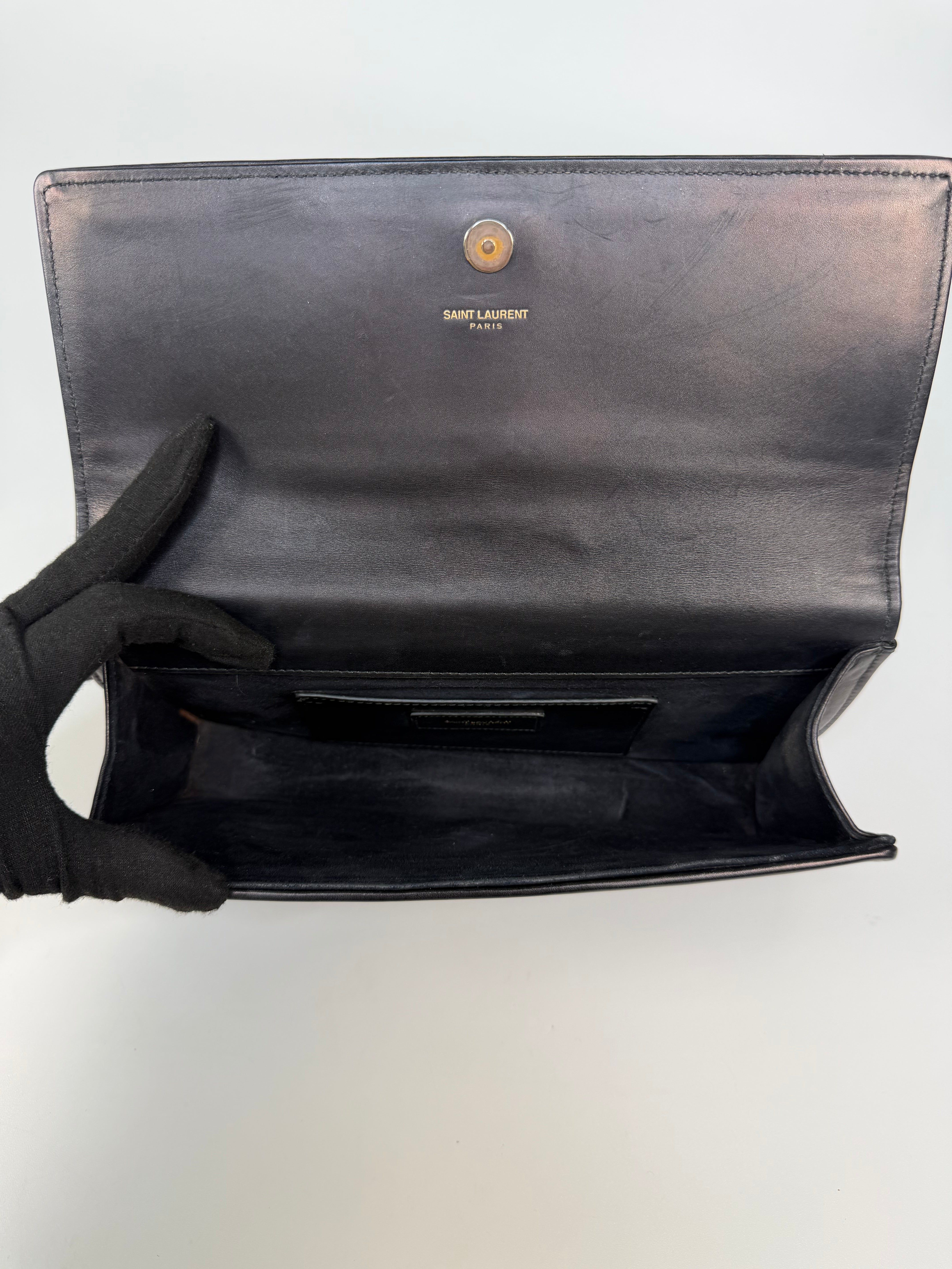 Saint Laurent Kate Long Clutch In Black Leather Gold Hardware. 100% authentic and preloved in very good condition