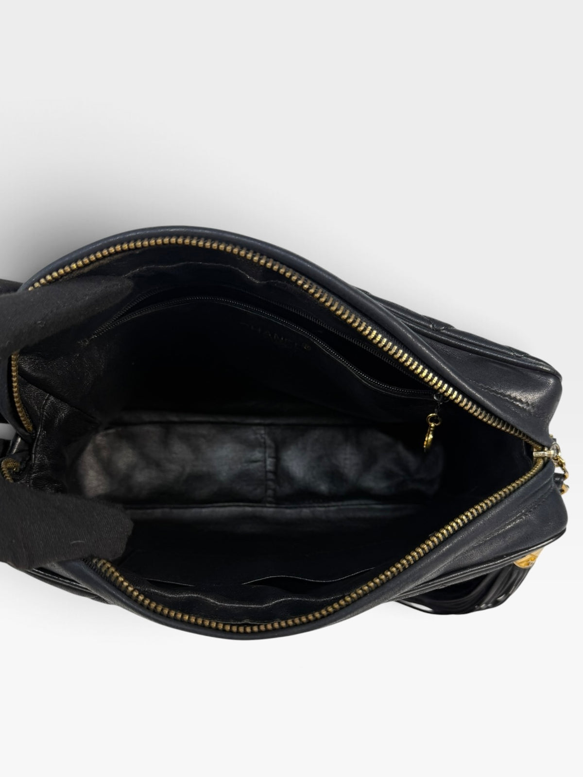Chanel Vintage Quilted Camera Bag In Black Lambskin With 24kt Gold Hardware 100% authentic and preloved in excellent condition