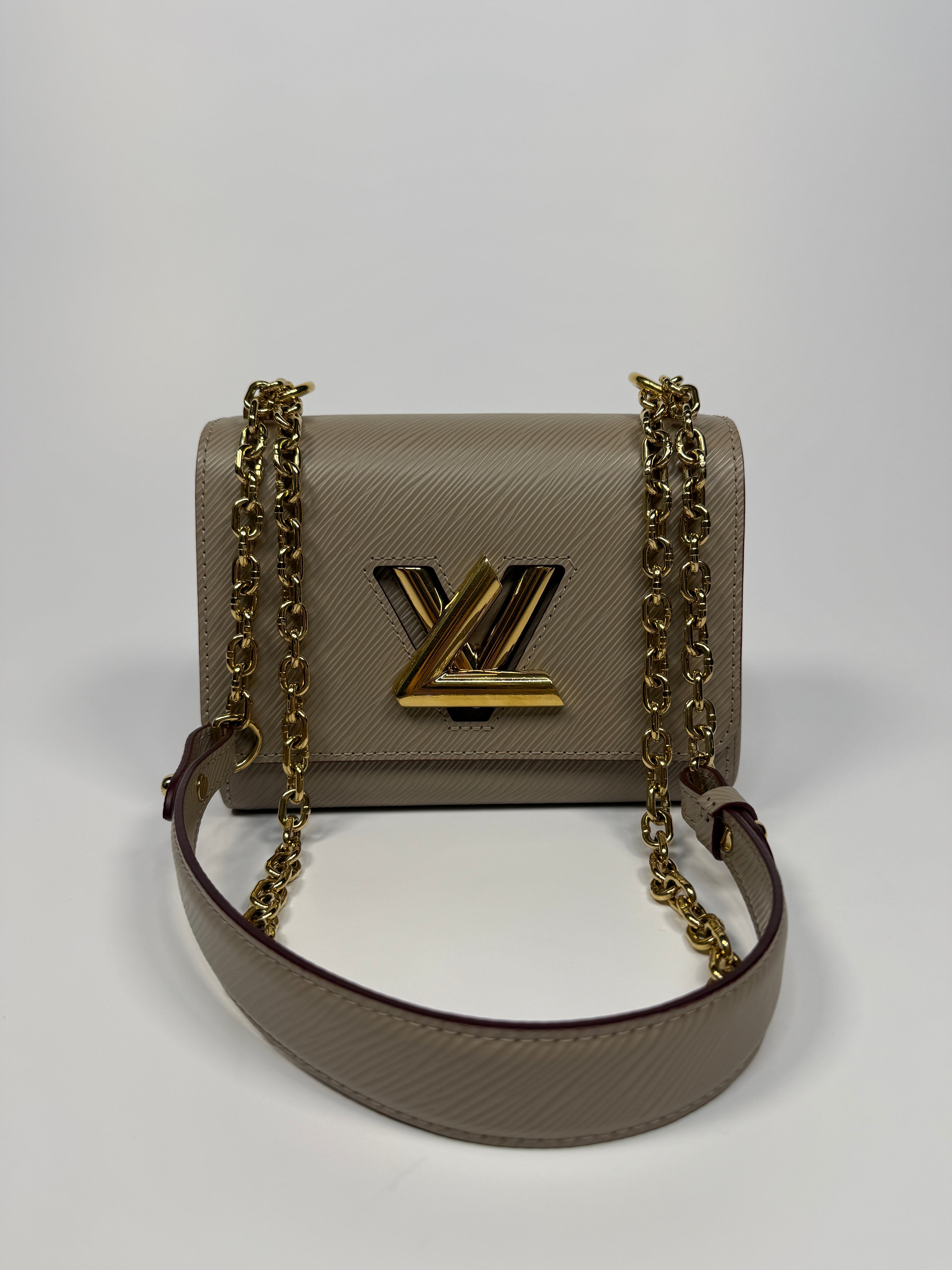 Louis Vuitton Twist PM Shoulder Bag In Beige leather with gold hardware. Authentic and pre loved excellent condition 