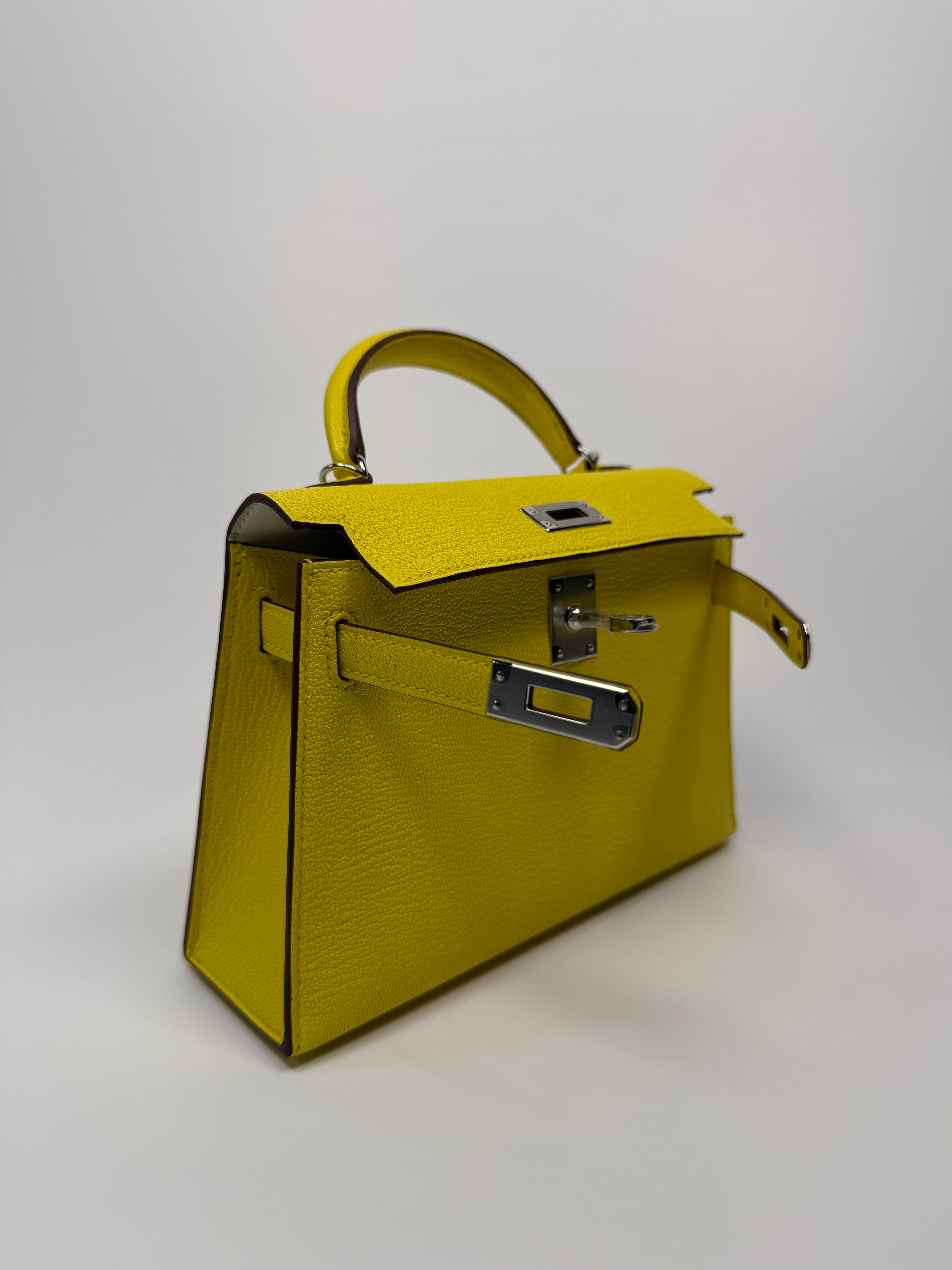Authentic Pre Loved Hermés Mini Kelly ll Sellier Verso Chèvre Mysore in Jaune Citron and Mushroom With Palladium Hardware New & Unused Condition