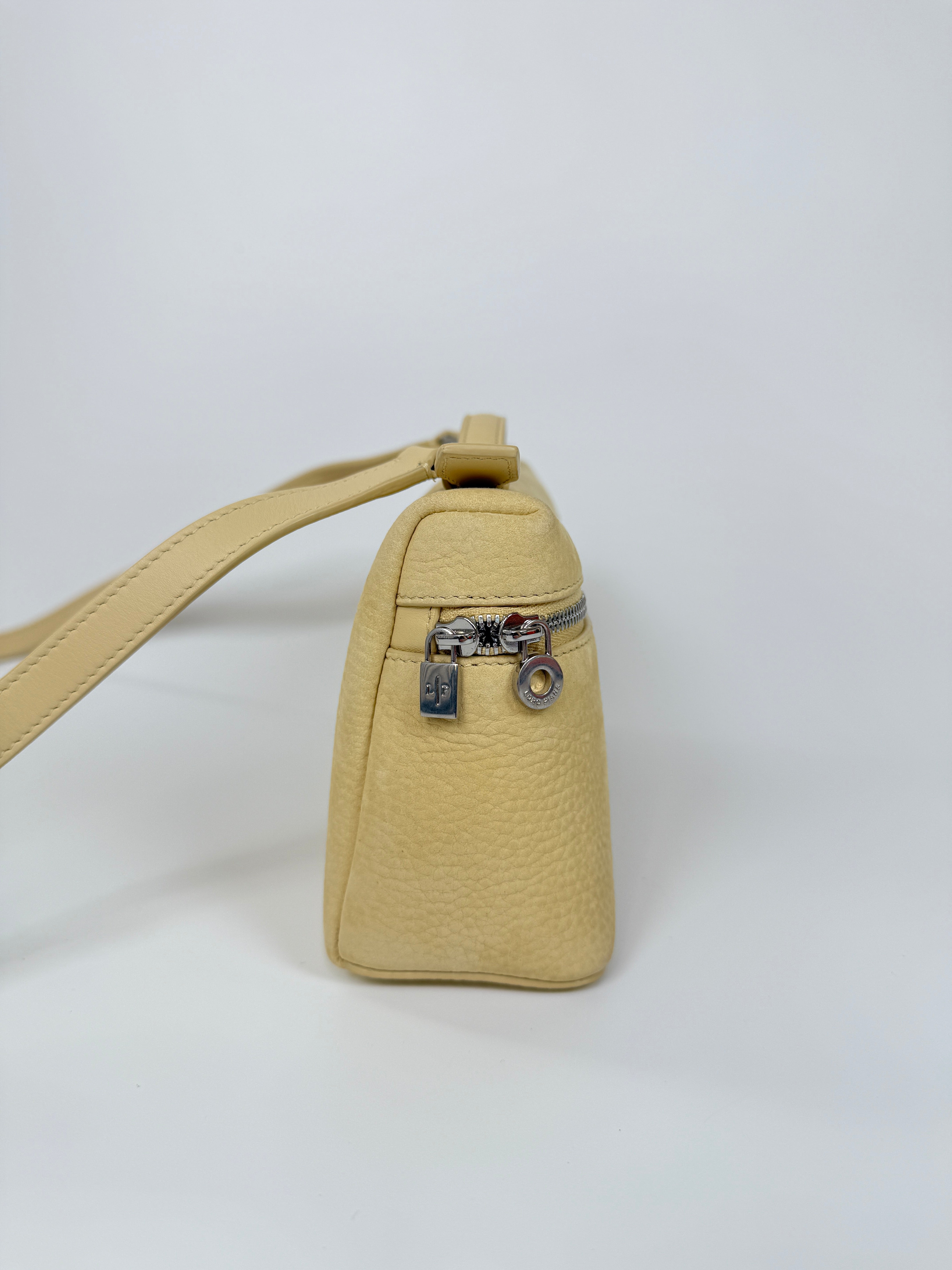 Loro Piana Extra Pocket L19 Bag In Chantilly Cream With silver hardware, Authentic and preloved. Very good condition. 100% Authenticity guarantee 