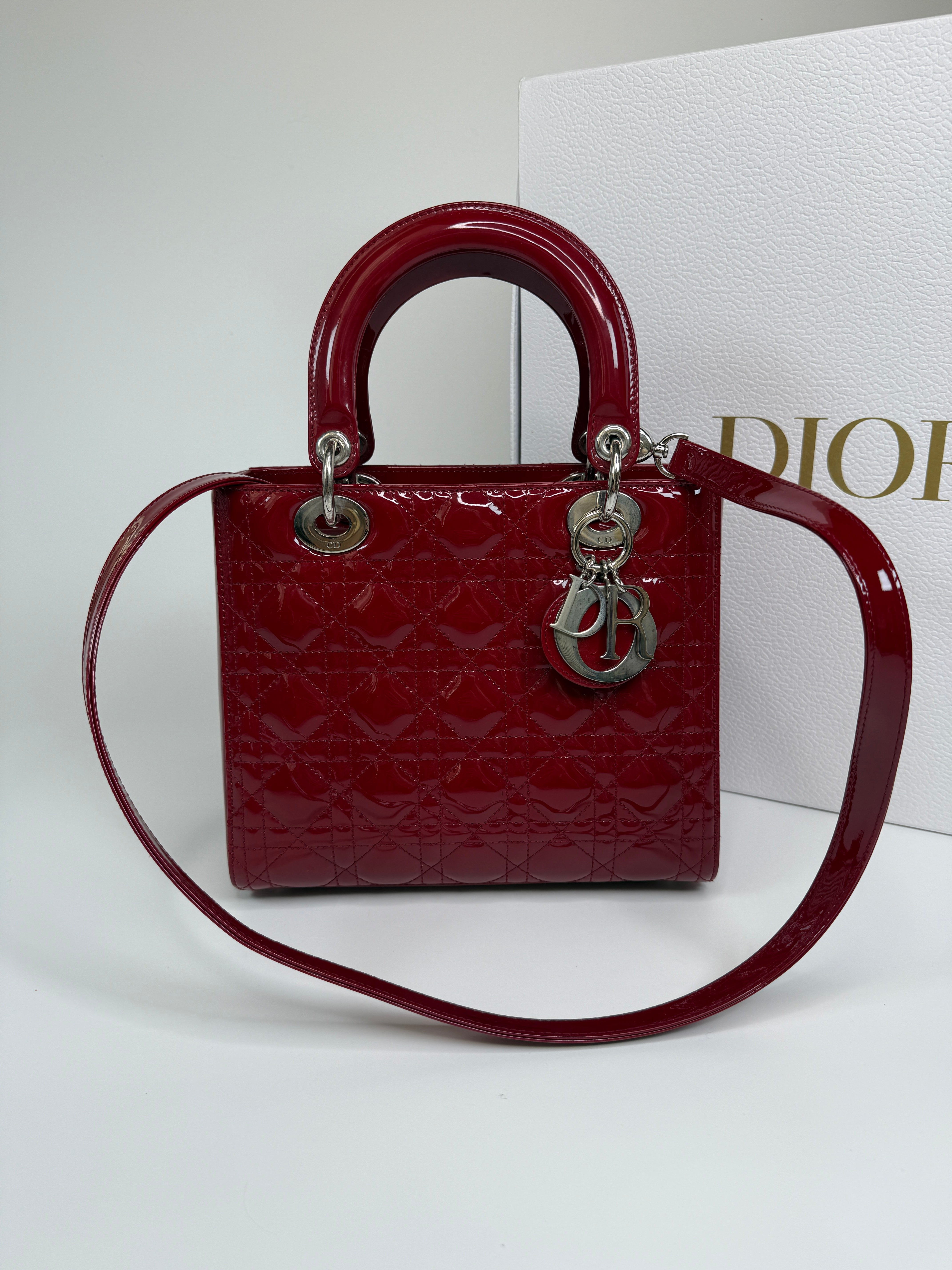 Christian Dior Medium Lady Dior In Patent Red Leather With Silver Hardware Authentic and preloved. 100% Authenticity Guarantee 