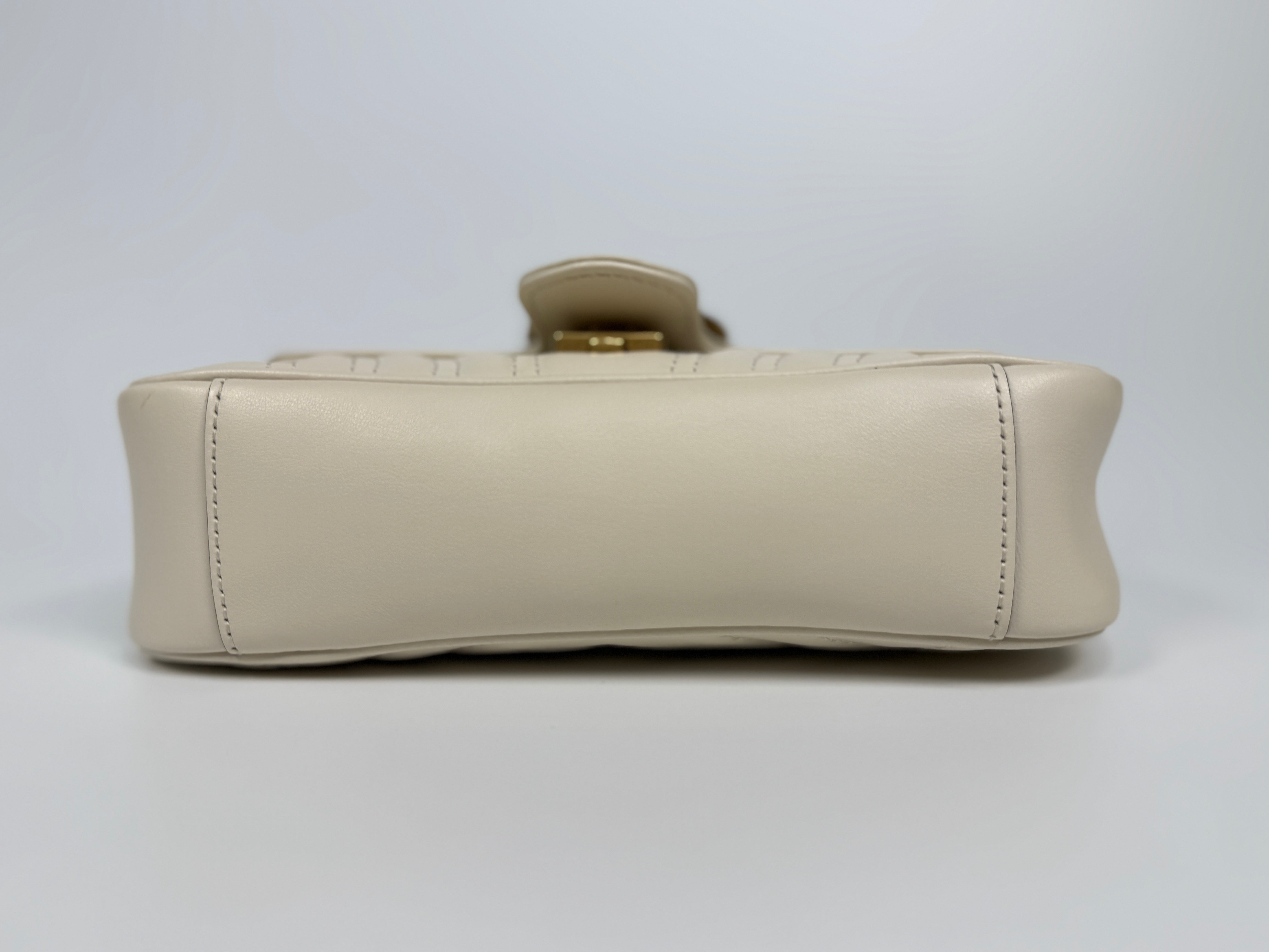 Gucci GG Small Marmont Matelasse Shoulder Bag In Ivory Leather With Gold Hardware 