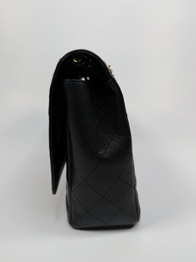 Chanel Maxi Classic Double Flap In Black Caviar Leather With GHW