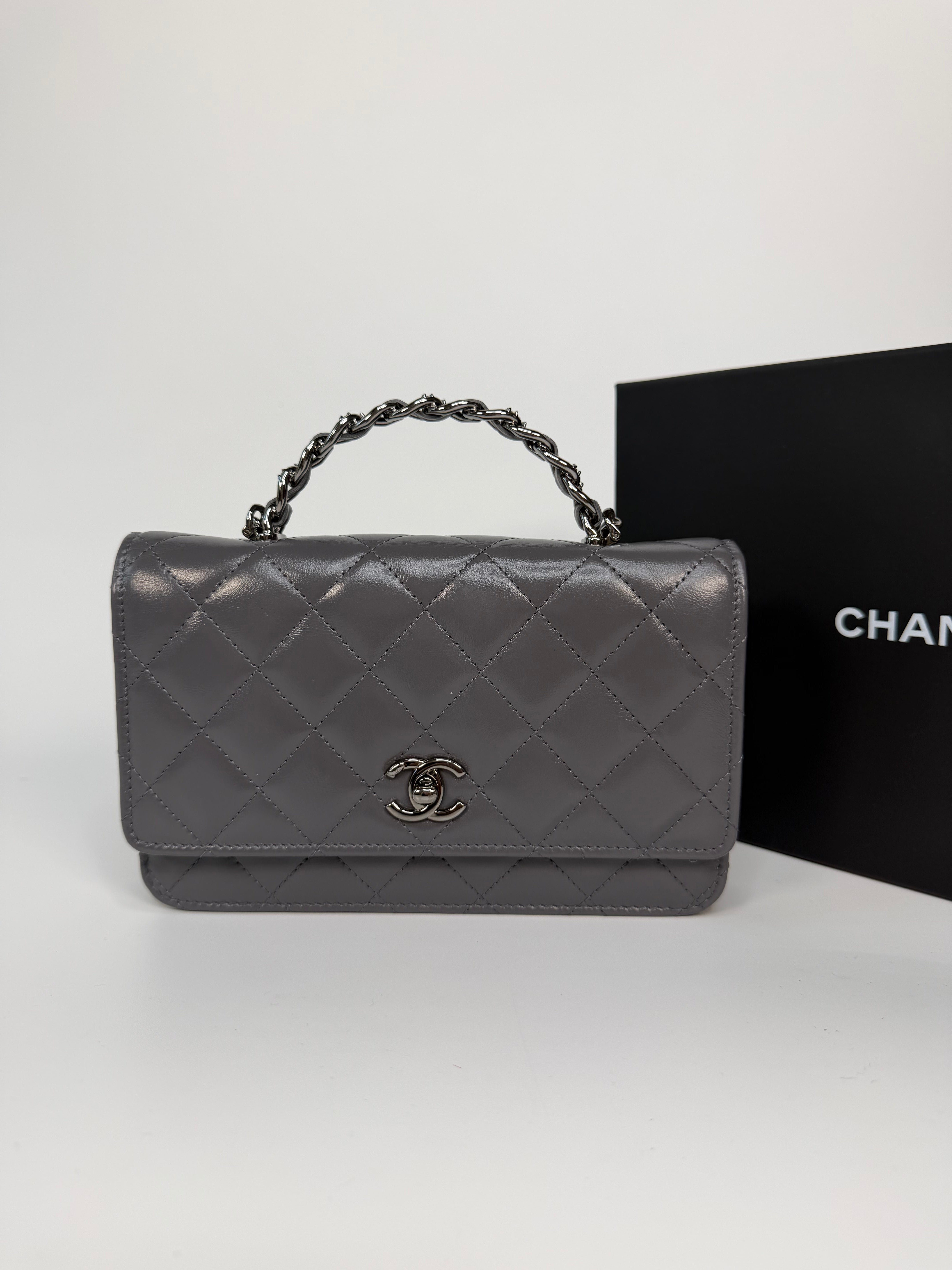 Chanel Wallet On Chain Top Handle In Grey Lambskin With Ruthenium Hardware. Authentic and preloved in excellent condition. 100% guarantee