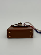 Hermès Kelly Twilly Charm In Gold Tadelakt Leather With GHW