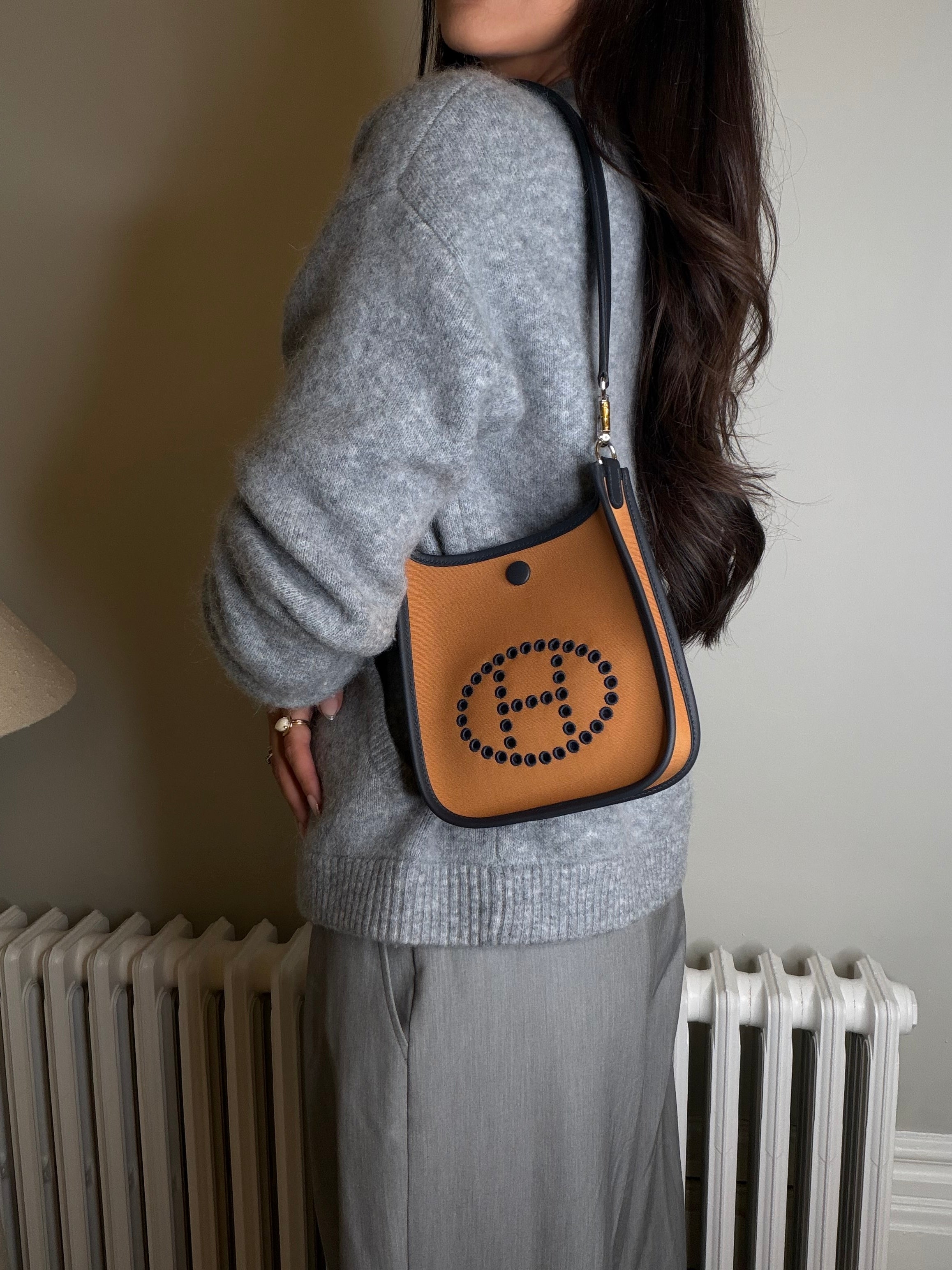 Hermès Evelyne TPM In Dune Cassis & Caban With Palladium hardware. Authentic and preloved. New condition.