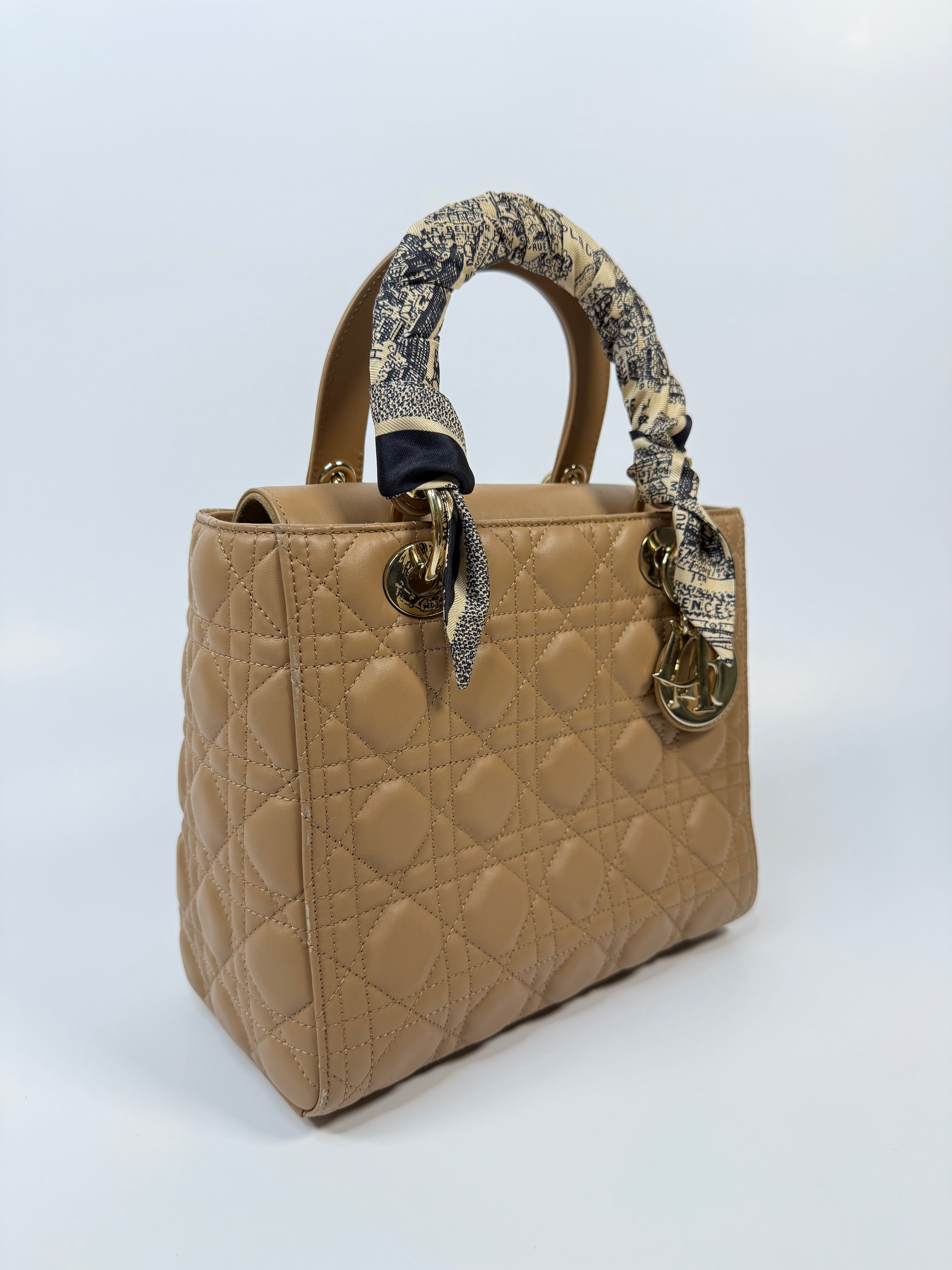 Authentic pre-loved Christian Dior Medium Lady Dior Bag in gold with gold hardware