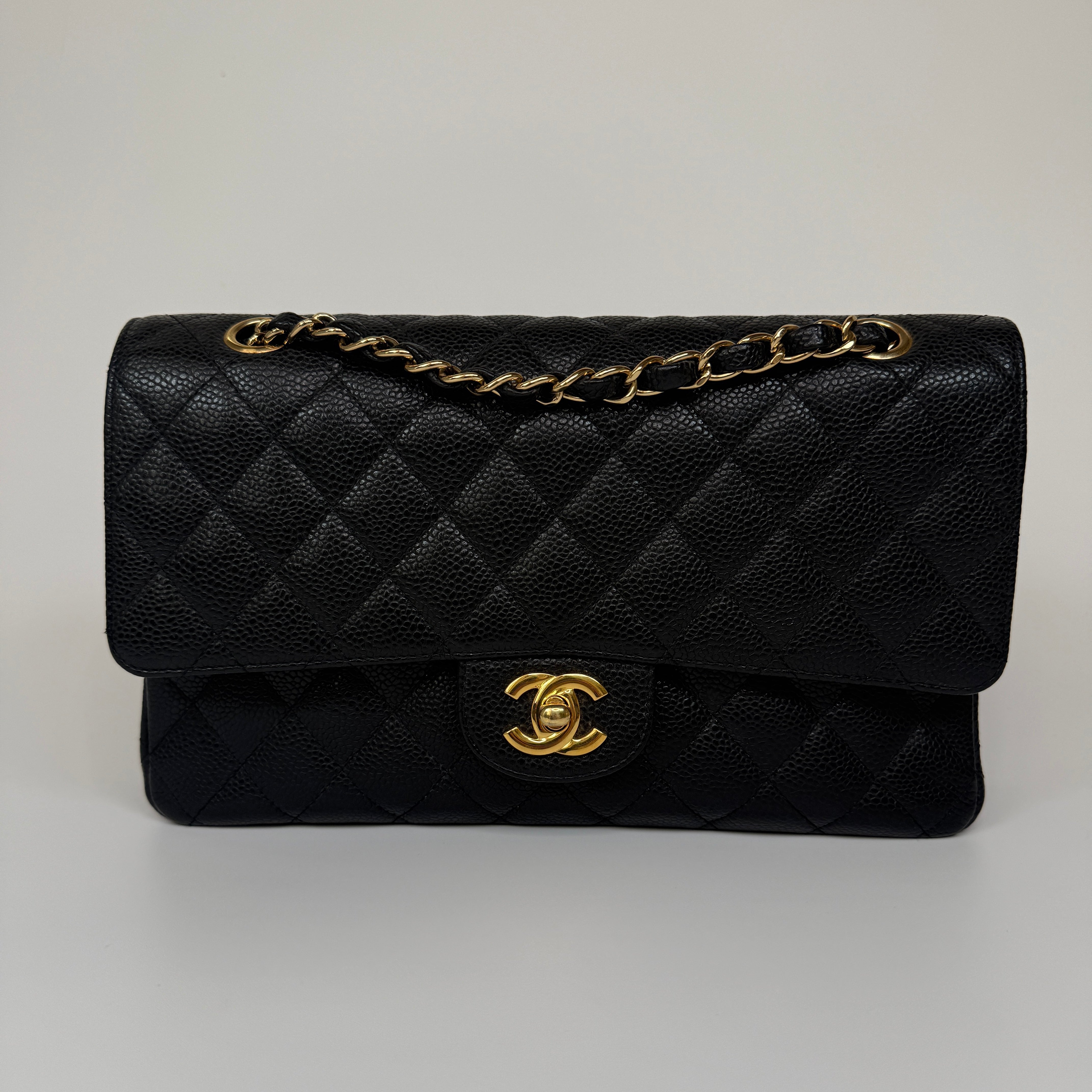 Chanel Medium Classic Double Flap Black Caviar Leather With Gold Hardware. Authentic and preloved. 100% Authenticity guarantee 