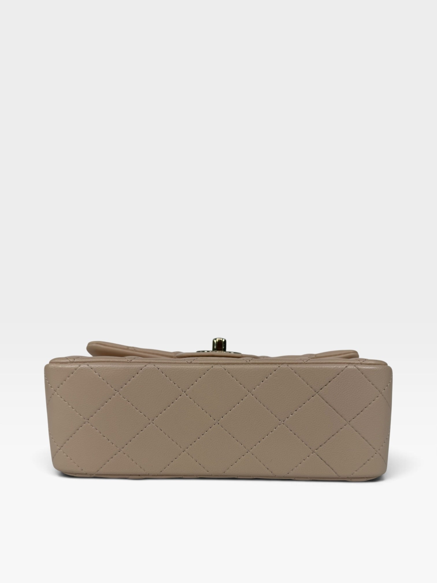 Chanel Mini Rectangle Top Handle Beige Lambskin Pale Gold Hardware. 100% authentic and preloved in excellent condition.