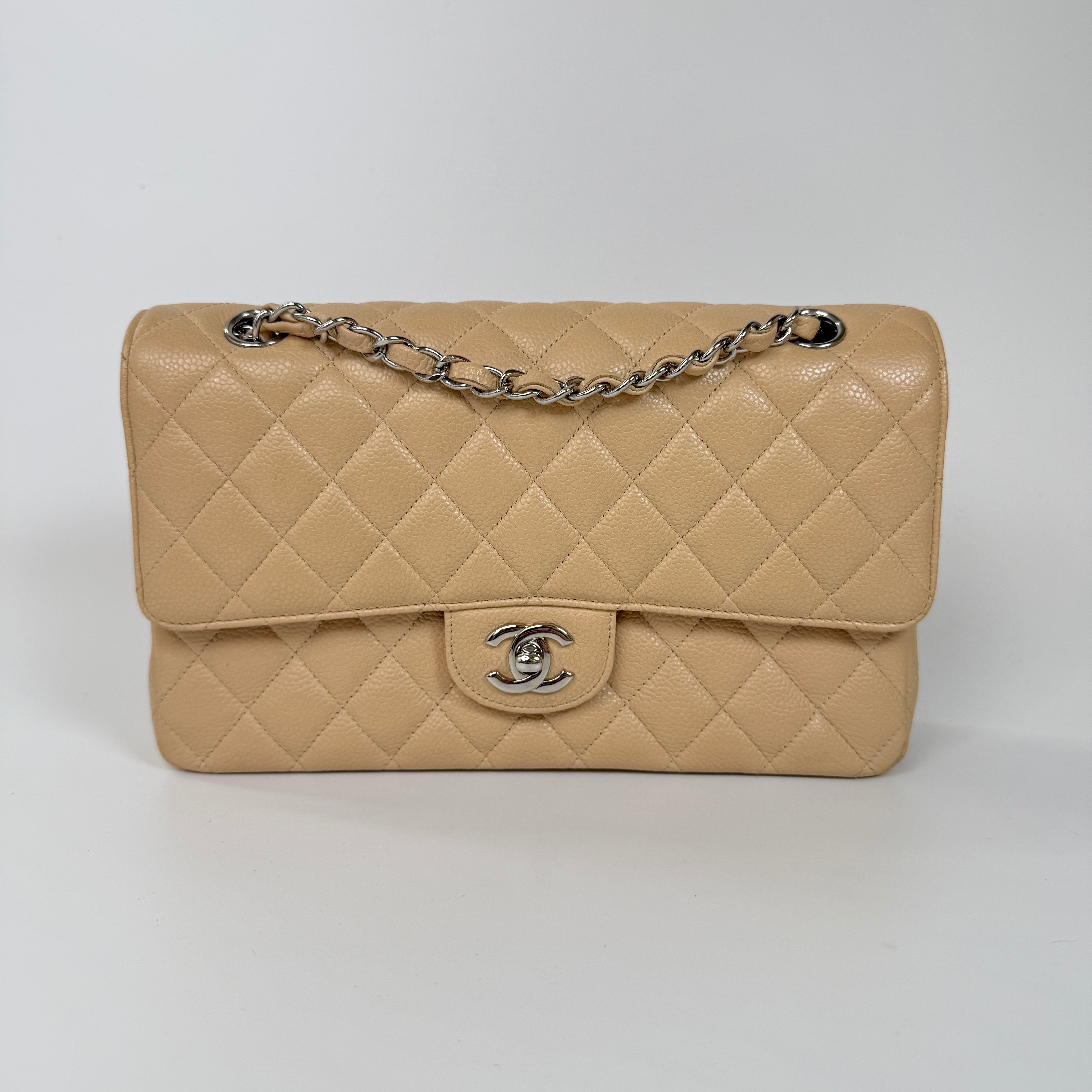 Chanel Medium Classic Double Flap Light Beige Caviar With Silver Hardware
Excellent condition, verified by Luxe Cheshire. International, fast  and fully insured delivery. Trusted designer resale.