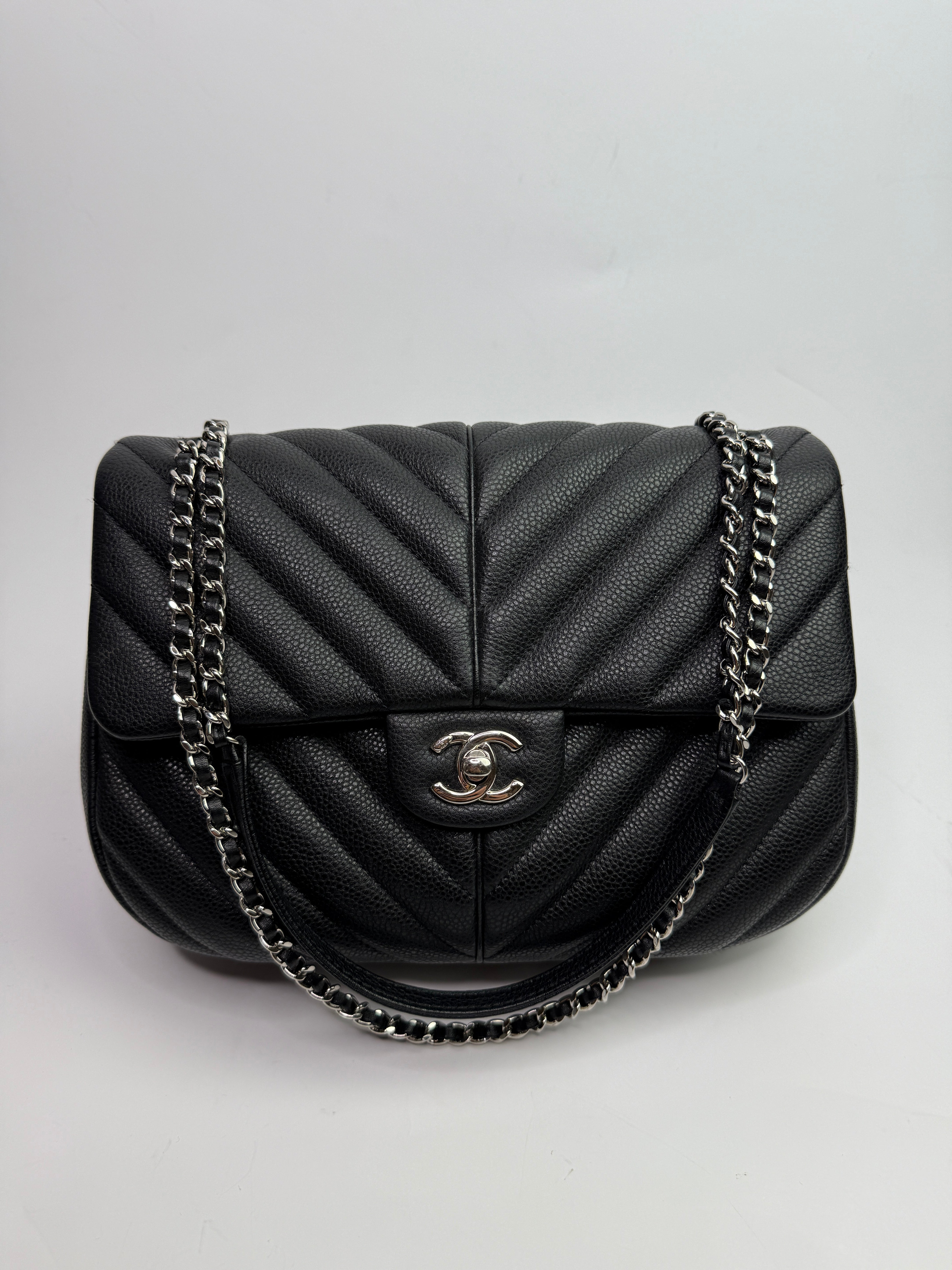 Chanel Seasonal Flap Bag In Black Chevron Caviar Leather With SHW