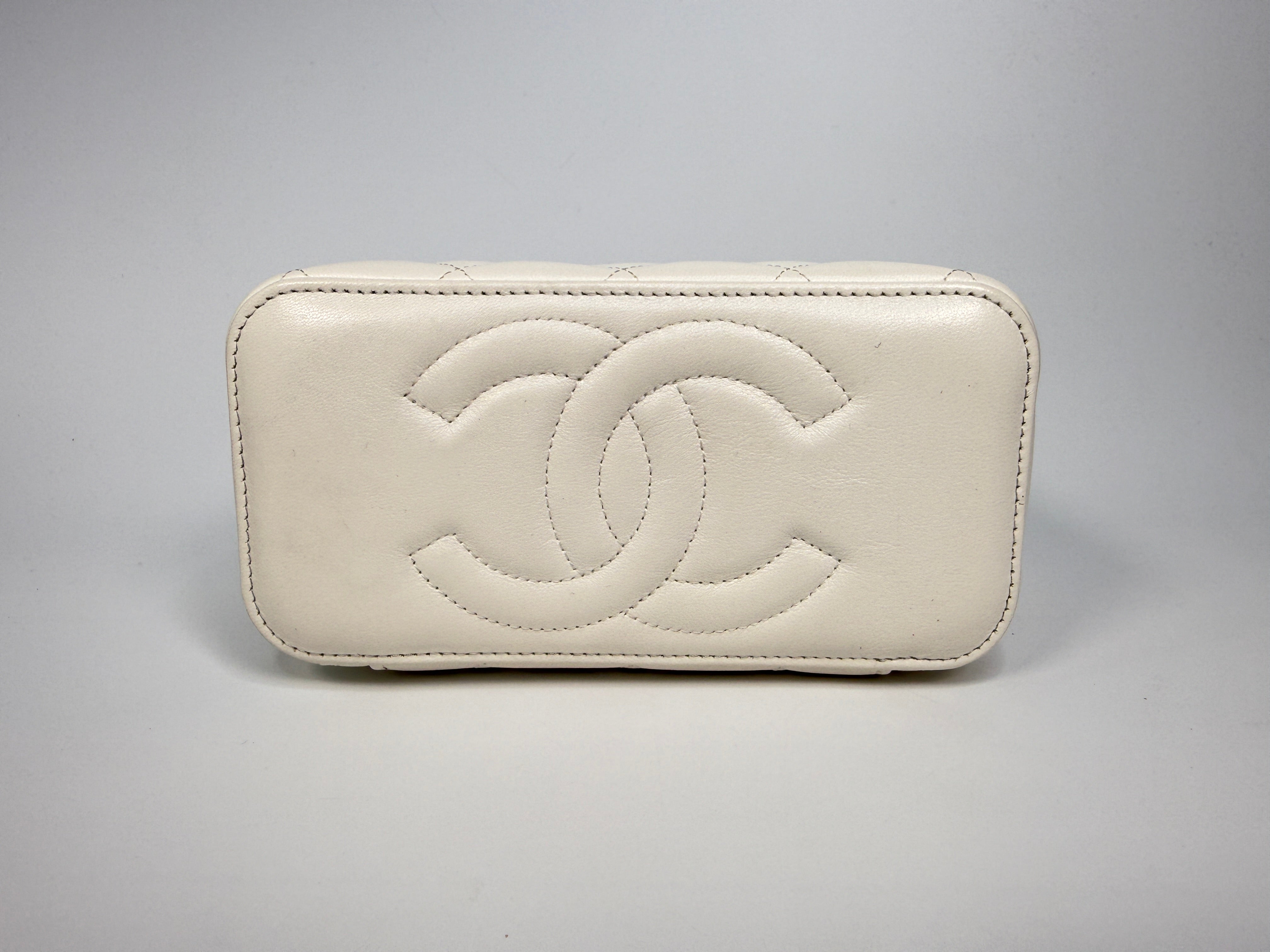 Authentic and preloved Chanel Quilted Pearl Crush Mini Vanity In White Lambskin Leather With Aged Gold Hardware