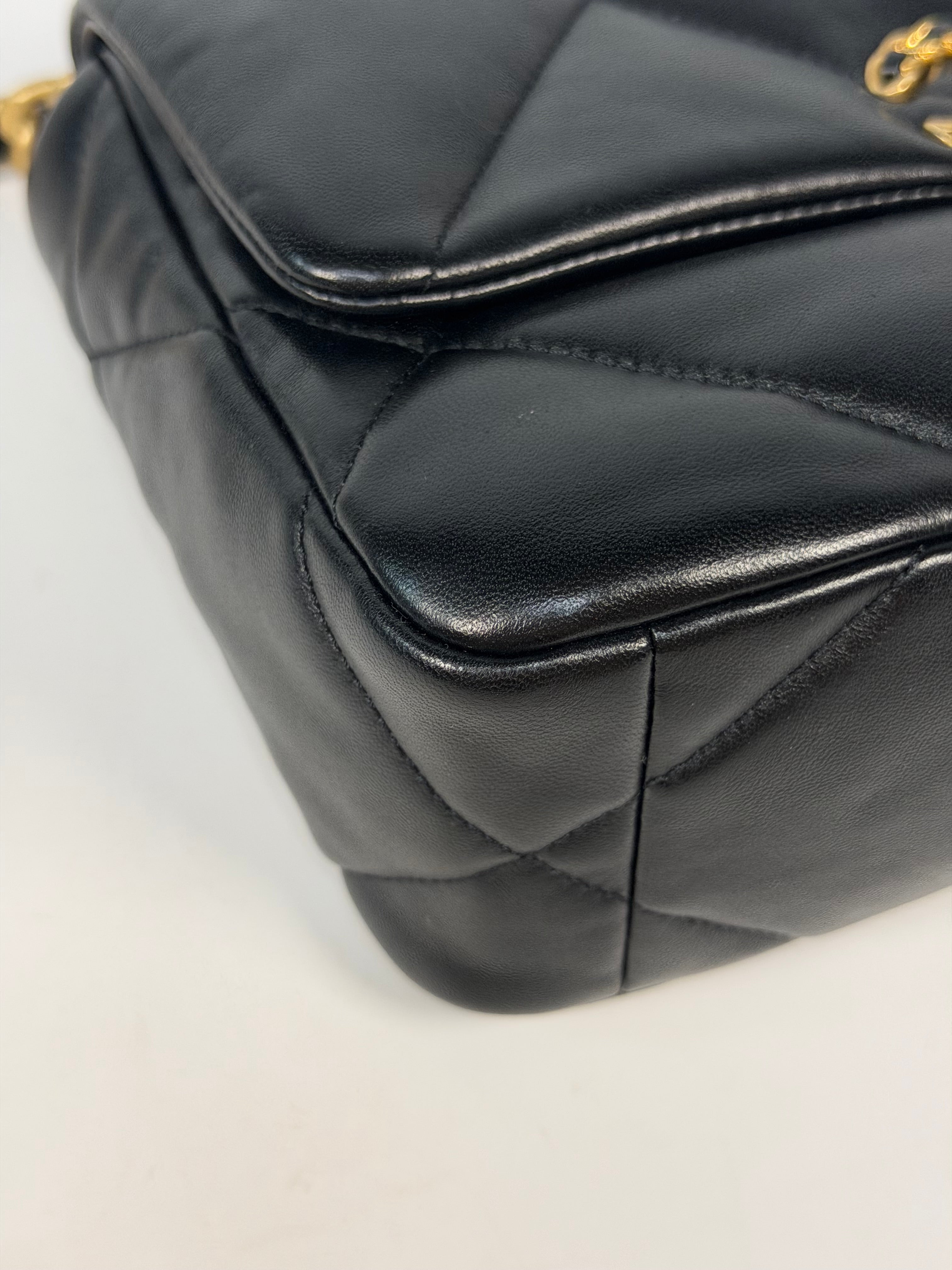 Chanel 19 Small In Black & White Leather With Mixed Hardware. Authentic and preloved in very good condition. Verified by Luxe Cheshire.