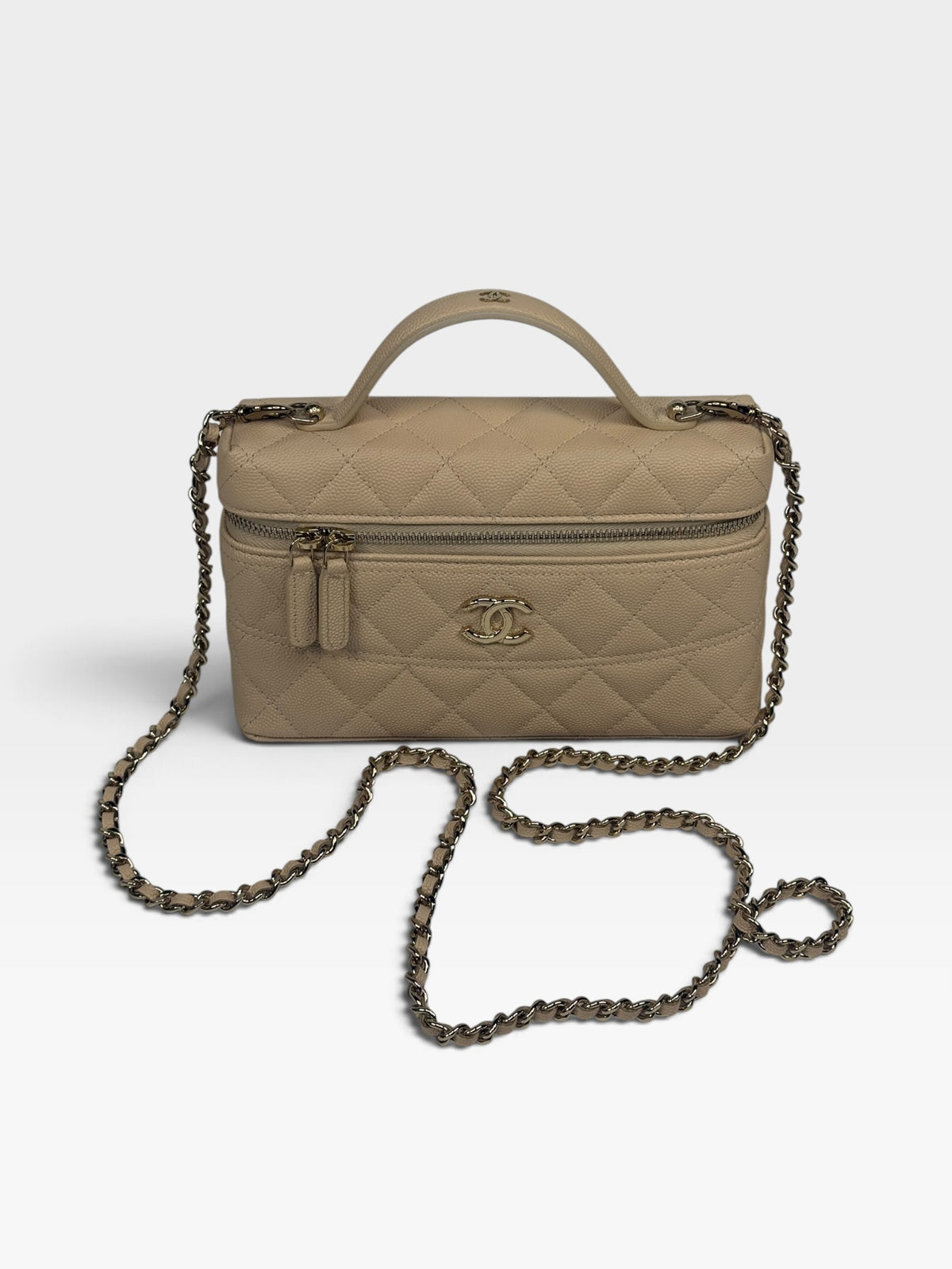 Chanel Flat Vanity In Beige Caviar Leather With Gold Hardware. 100% authentic and pre loved in excellent condition.
