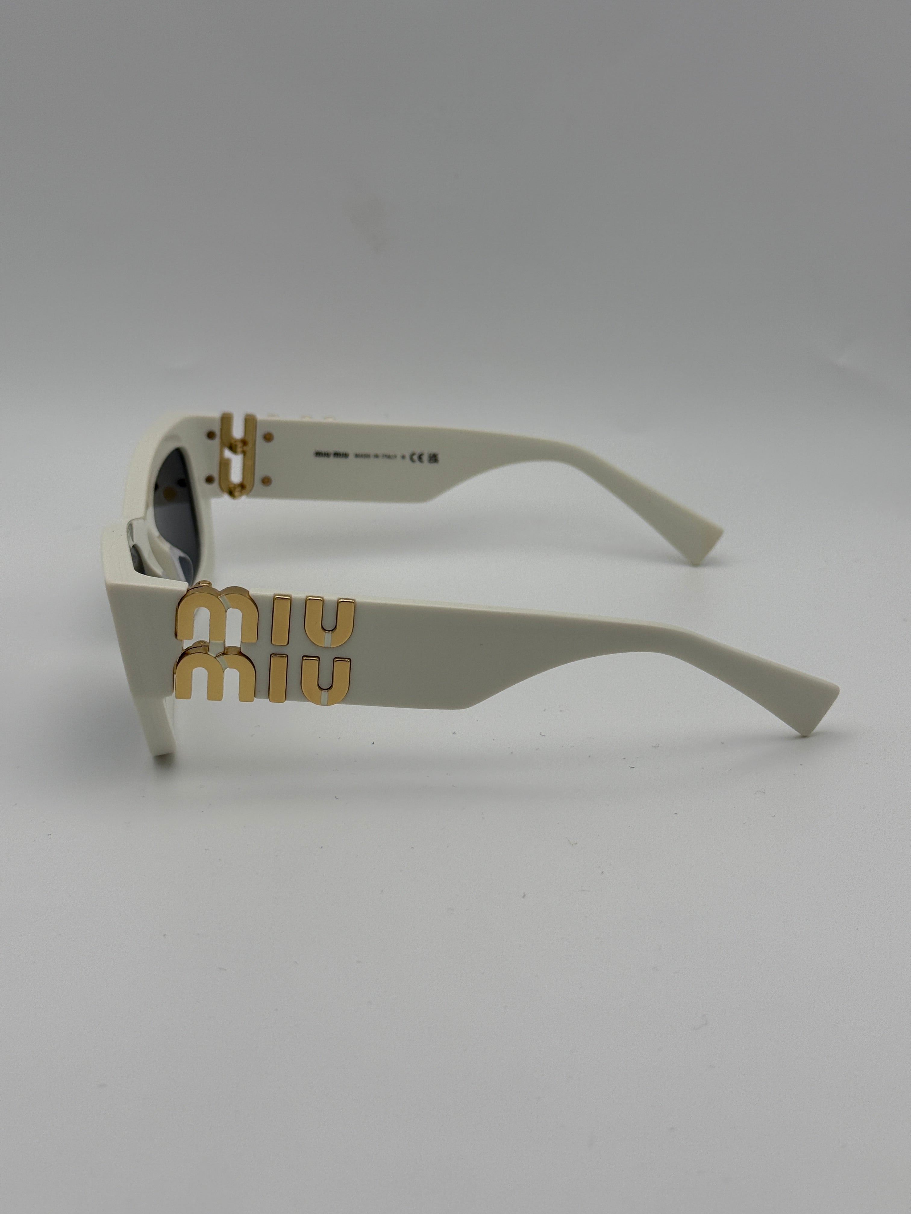 MiuMiu White logo sunglasses, Authentic and preloved. 100% Authenticity guarantee 