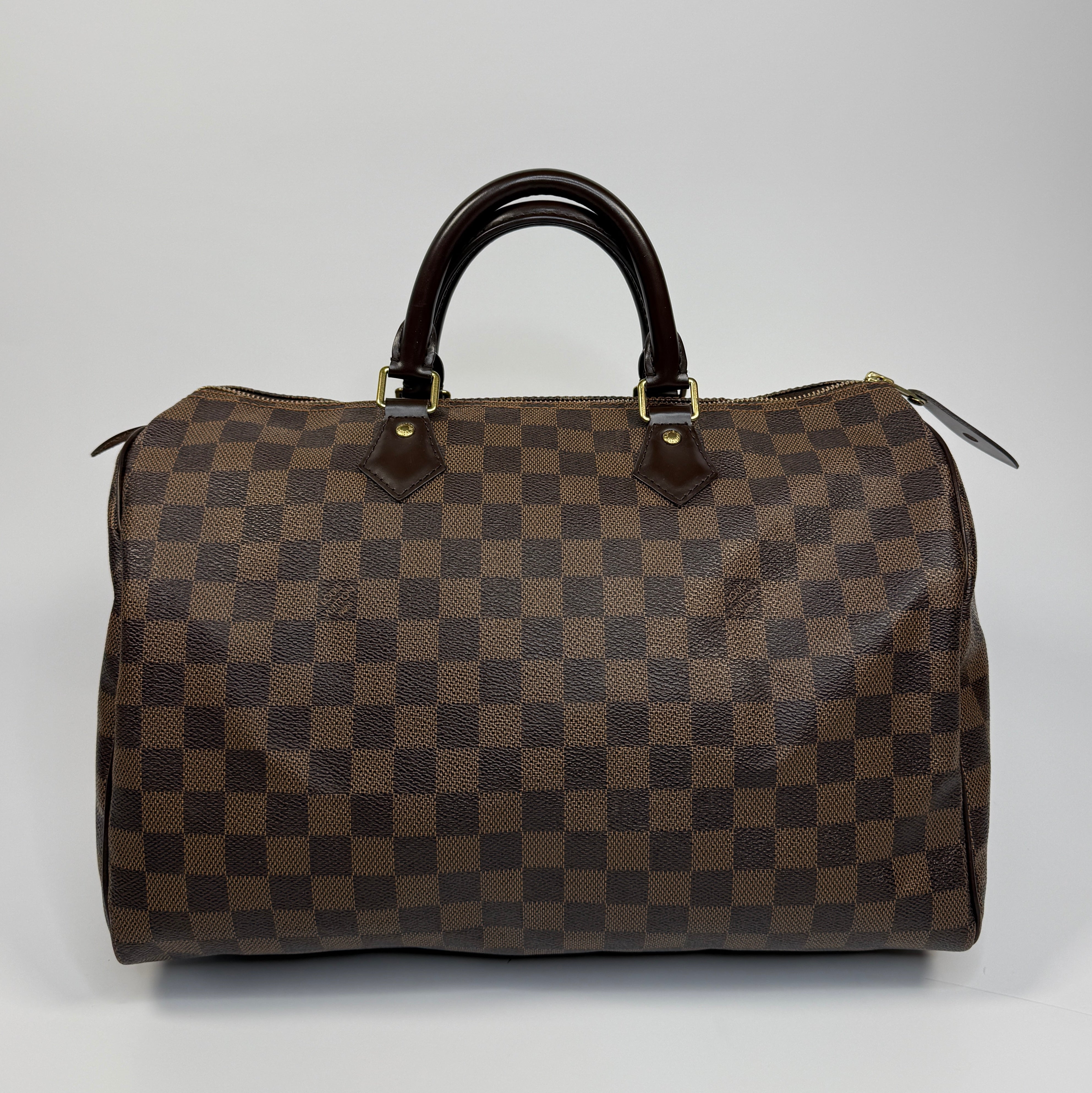 Authentic and pre loved Louis Vuitton Damier Ebene Speedy 35 In Damier Ebene With Gold Hardware In Excellent Condition