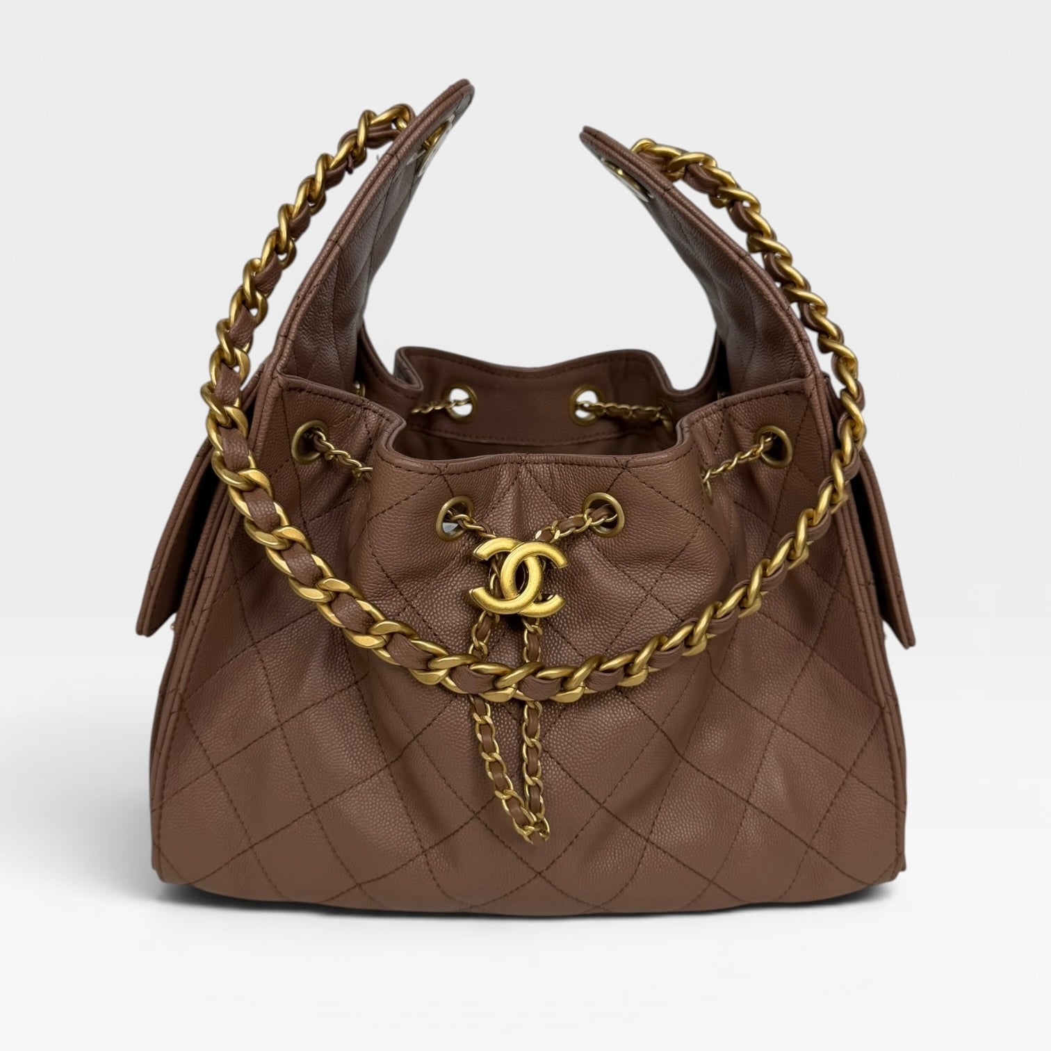 Chanel 25 Small In Brown Caviar Leather With Gold Hardware. Authentic and preloved in excellent condition