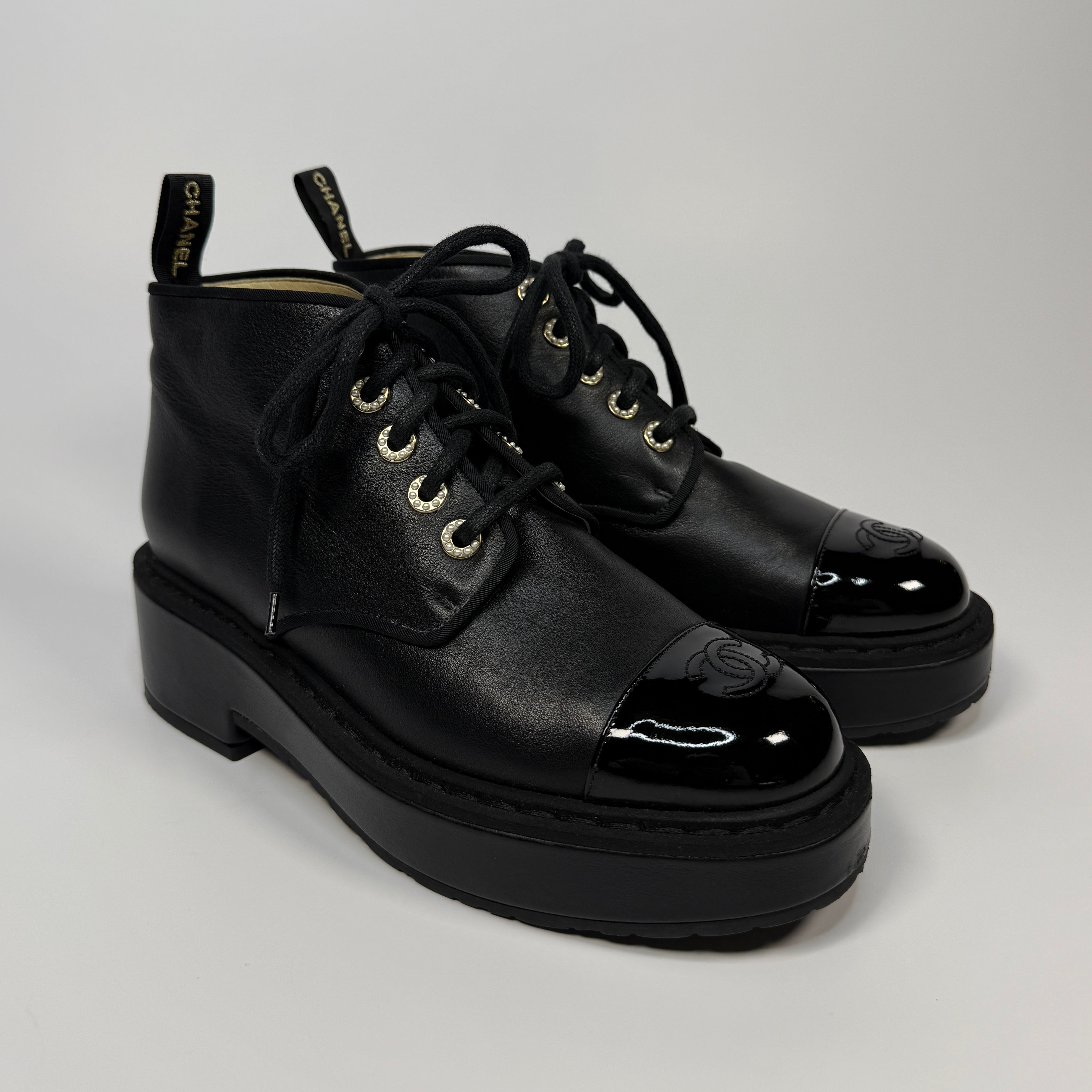 Chanel CC Toe Cap and pearl eyelet Anklet boots In Black Leather. UK6.5 Excellent. Authentic and preloved. 
