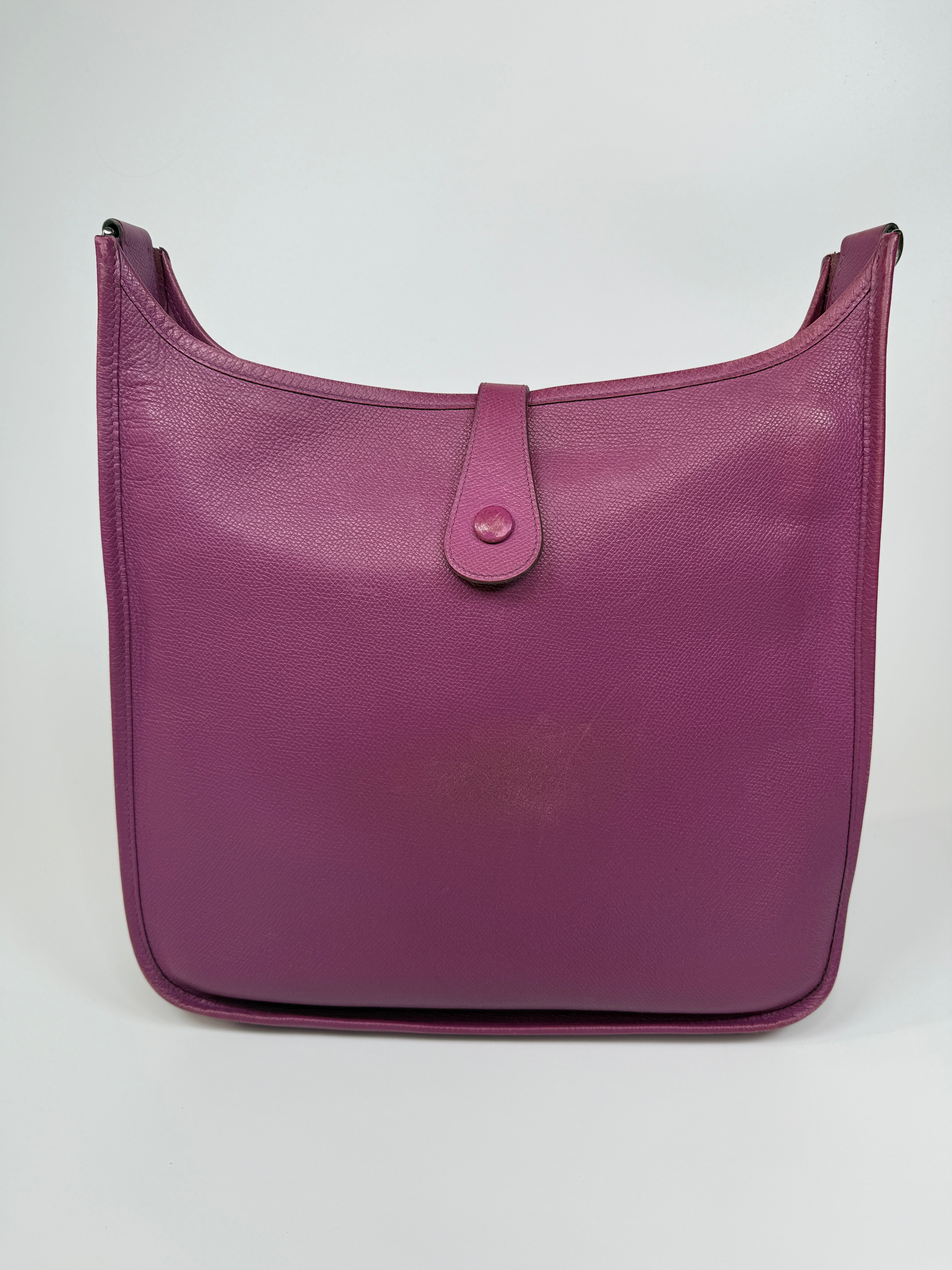 Authentic and preloved Hermès Evelyne 29 In Purple Clemence Leather With Palladium Hardware. Good Condition. 100% Authenticity Guarantee 