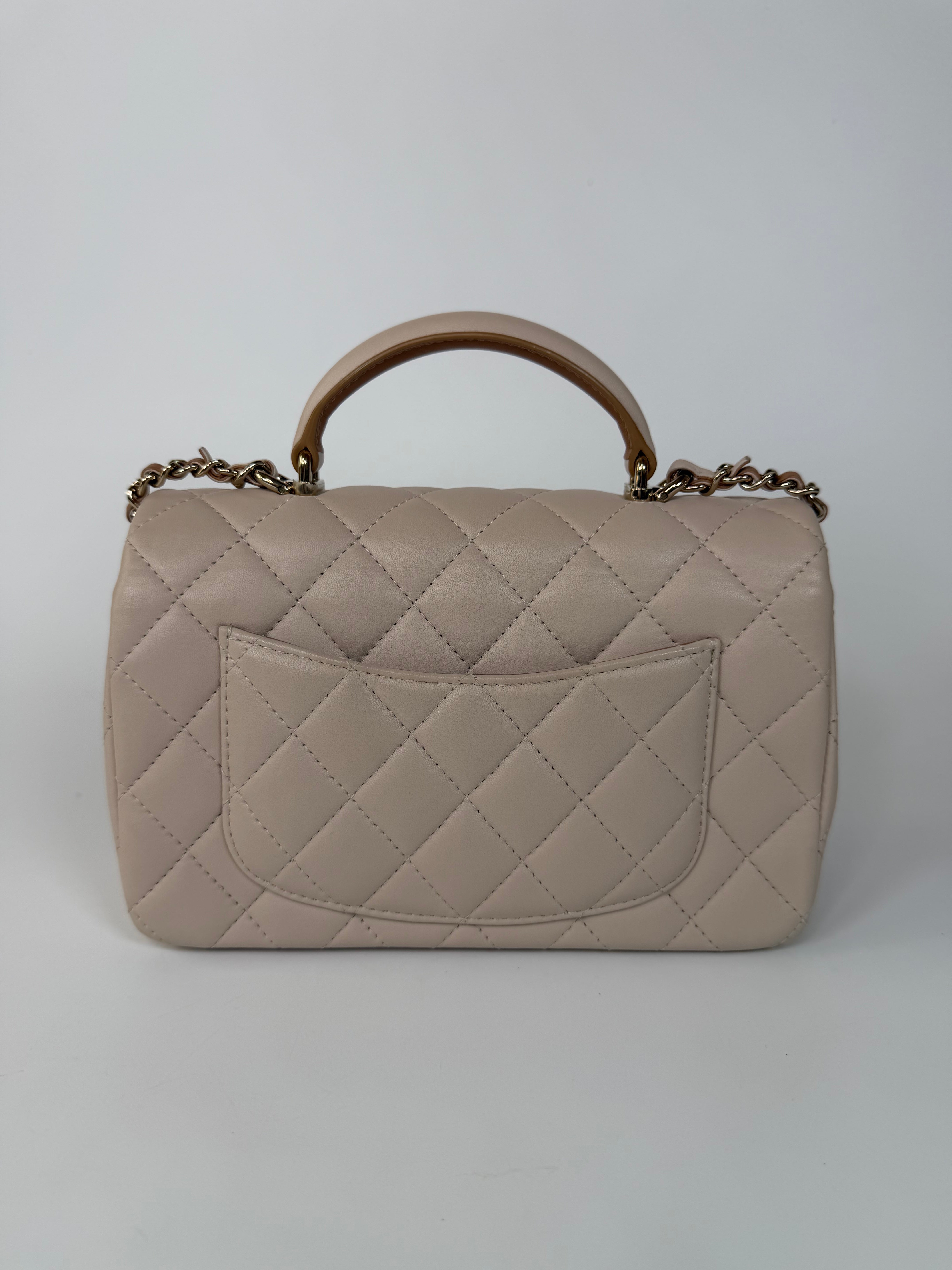 Chanel Mini Rectangle Top Handle Light Beige Lambskin Pale Gold Hardware in excellent condition 100% authentic and preloved