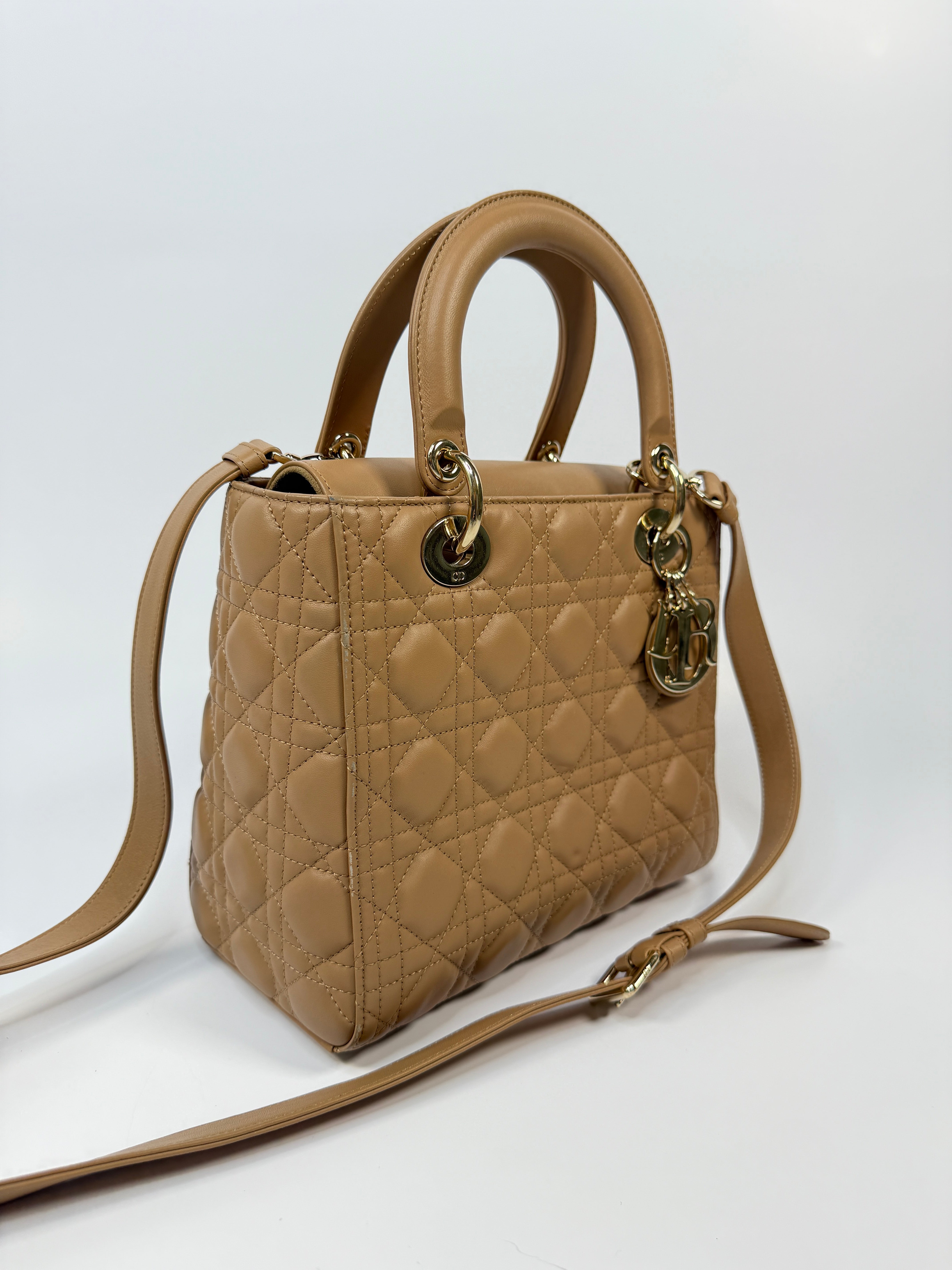 Authentic pre-loved Christian Dior Medium Lady Dior Bag in gold with gold hardware