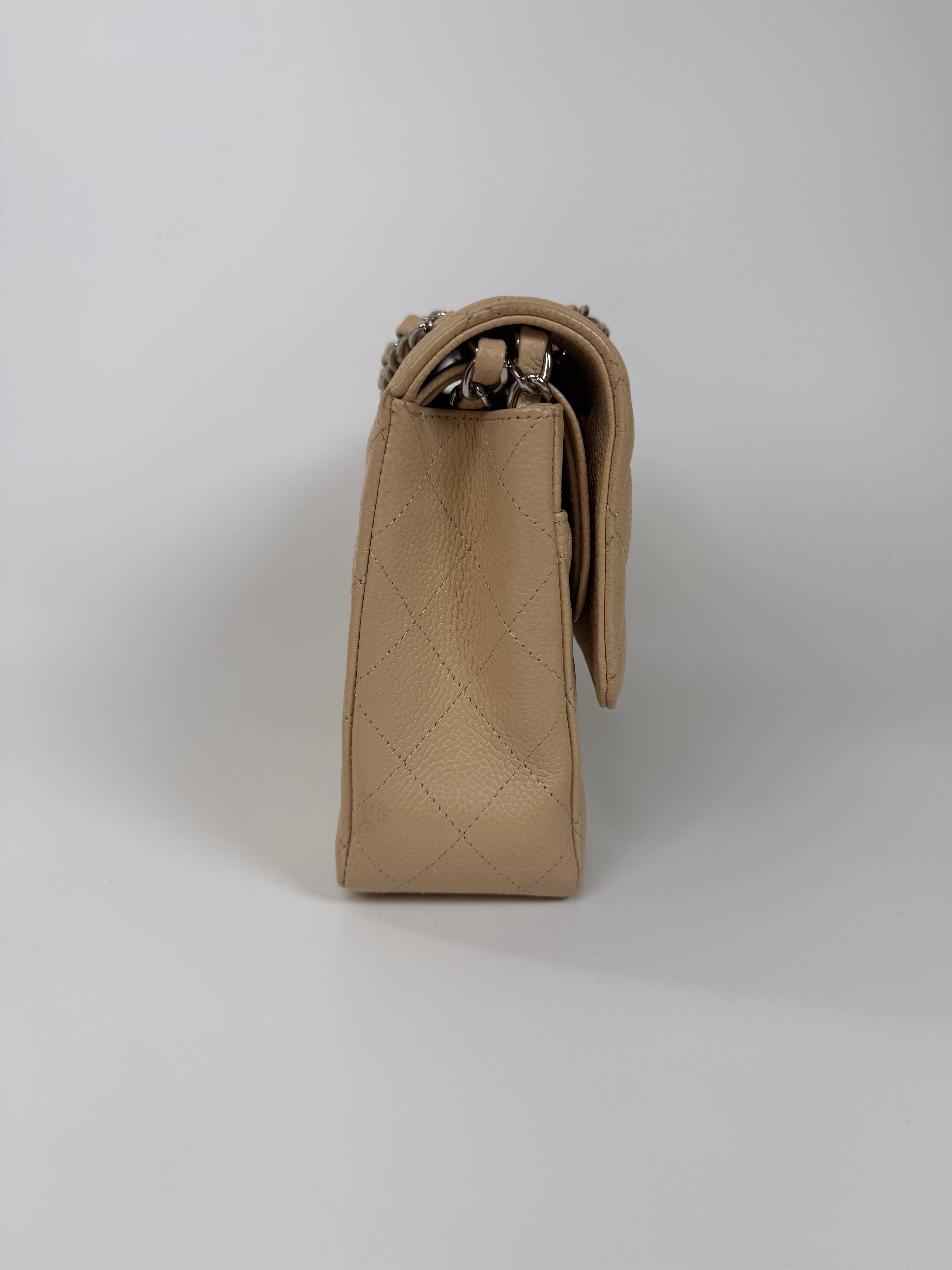 Chanel Medium Classic Double Flap Light Beige Caviar With Silver Hardware
Excellent condition, verified by Luxe Cheshire. International, fast  and fully insured delivery. Trusted designer resale.