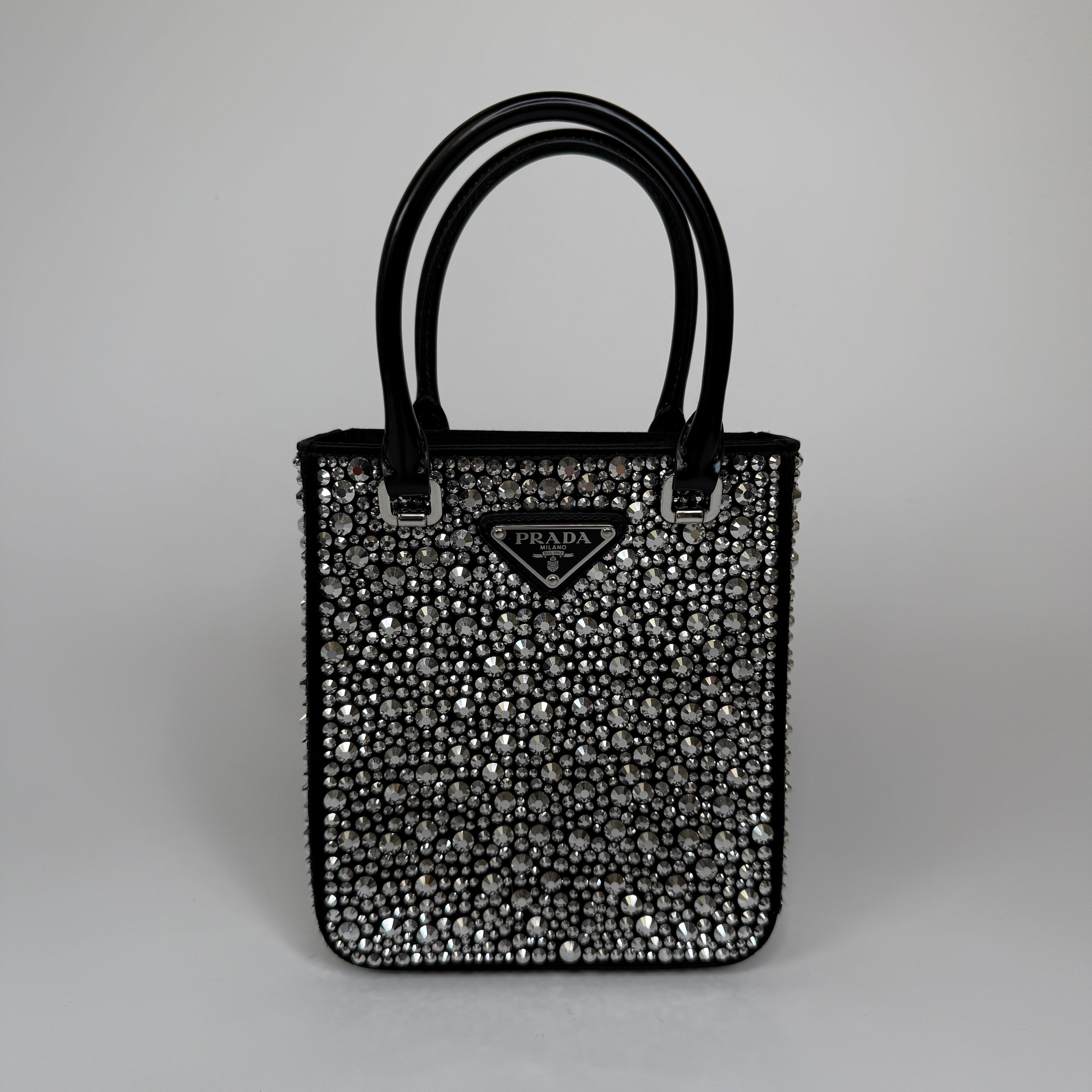 Prada Mini Tote In Black Crystal Leather With Silver Hardware Excellent Condition. 100% Authenticity guarantee. 