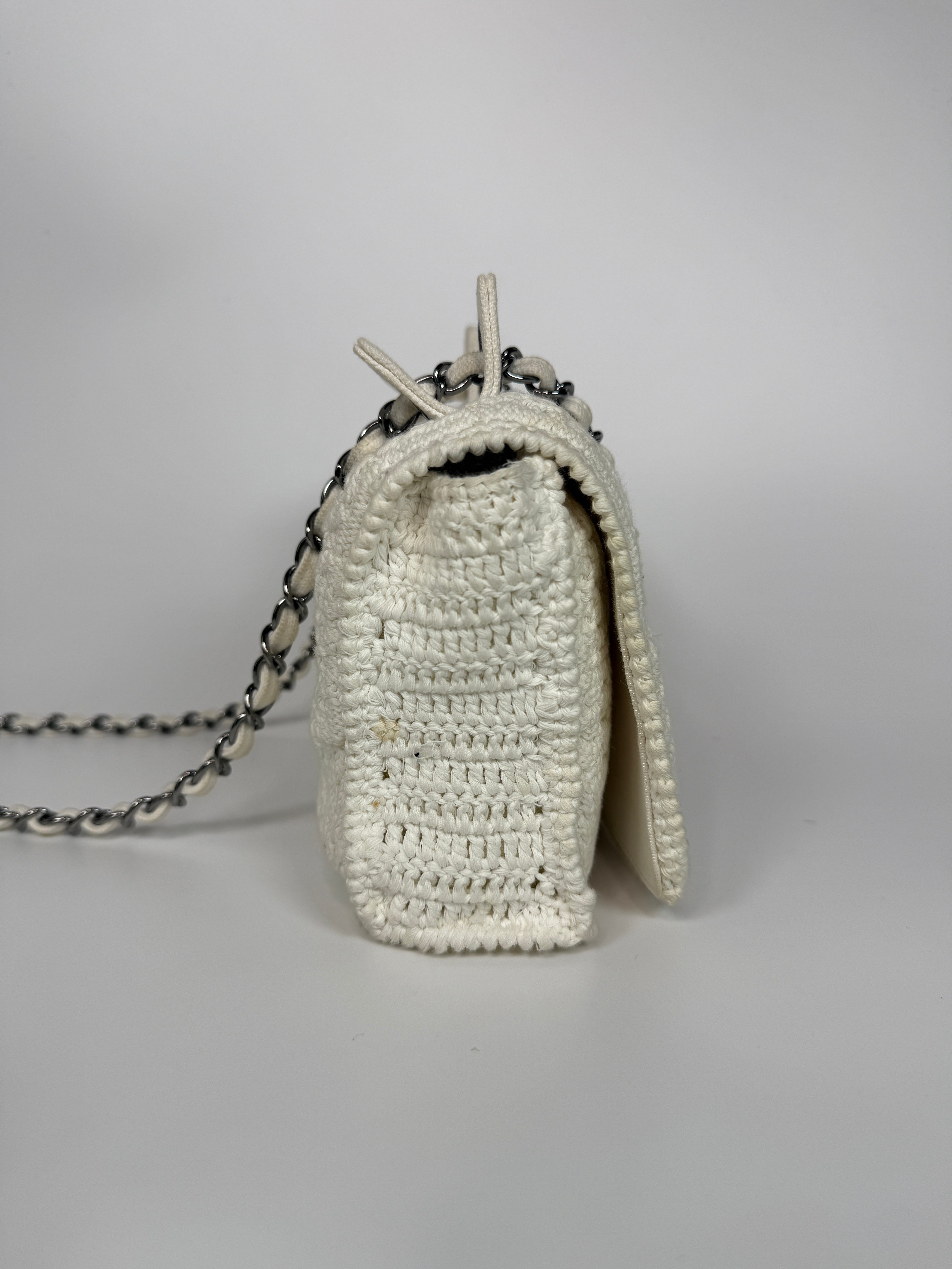 Authentic and preloved Chanel Vintage White Crotchet Flap Bag With Silver hardware. Good condition. 100% Authenticity guarantee 