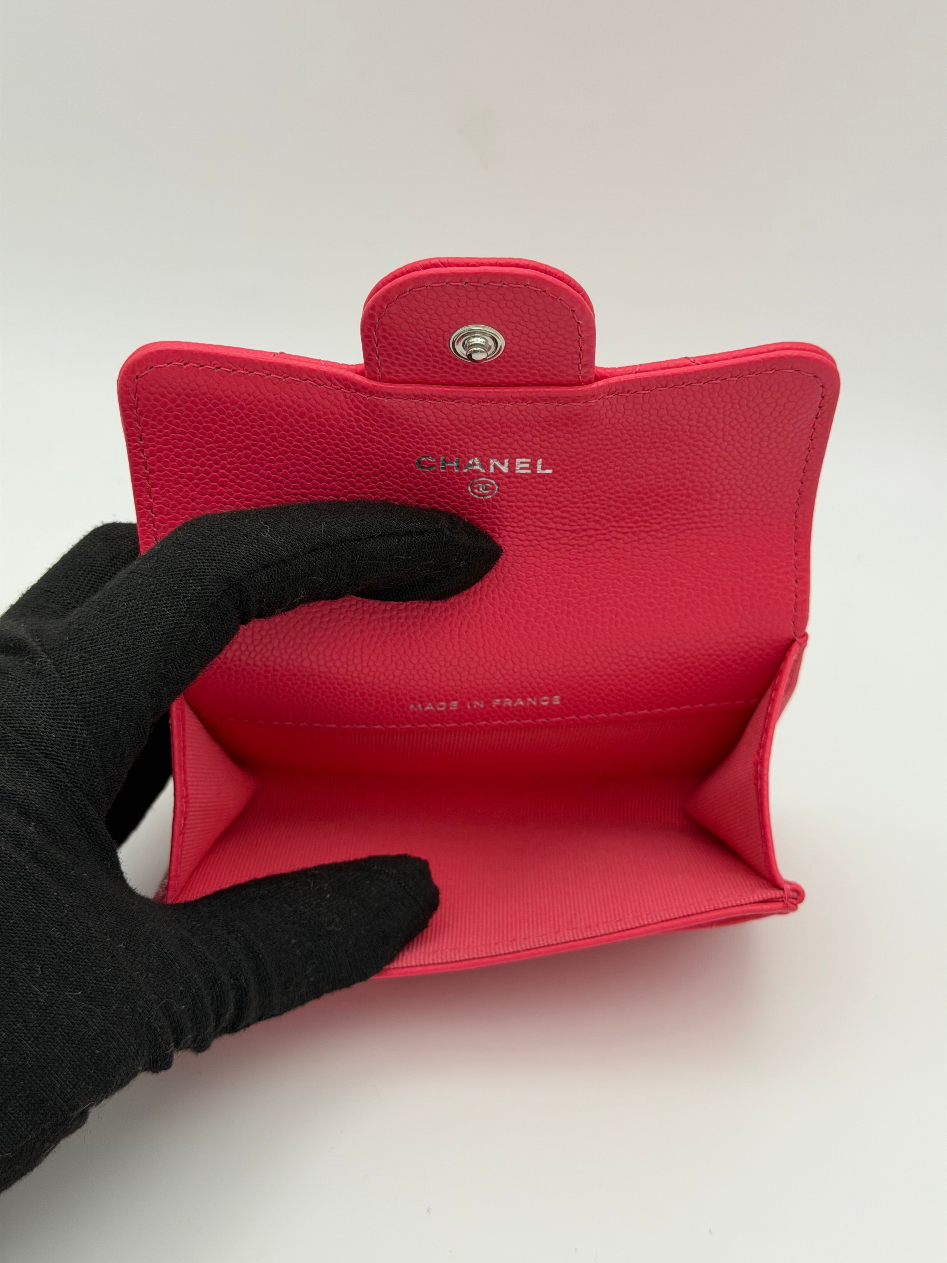 Chanel Classic Card Holder In Hot Pink Caviar Leather With Silver Hardware. Authentic and preloved in excellent condition