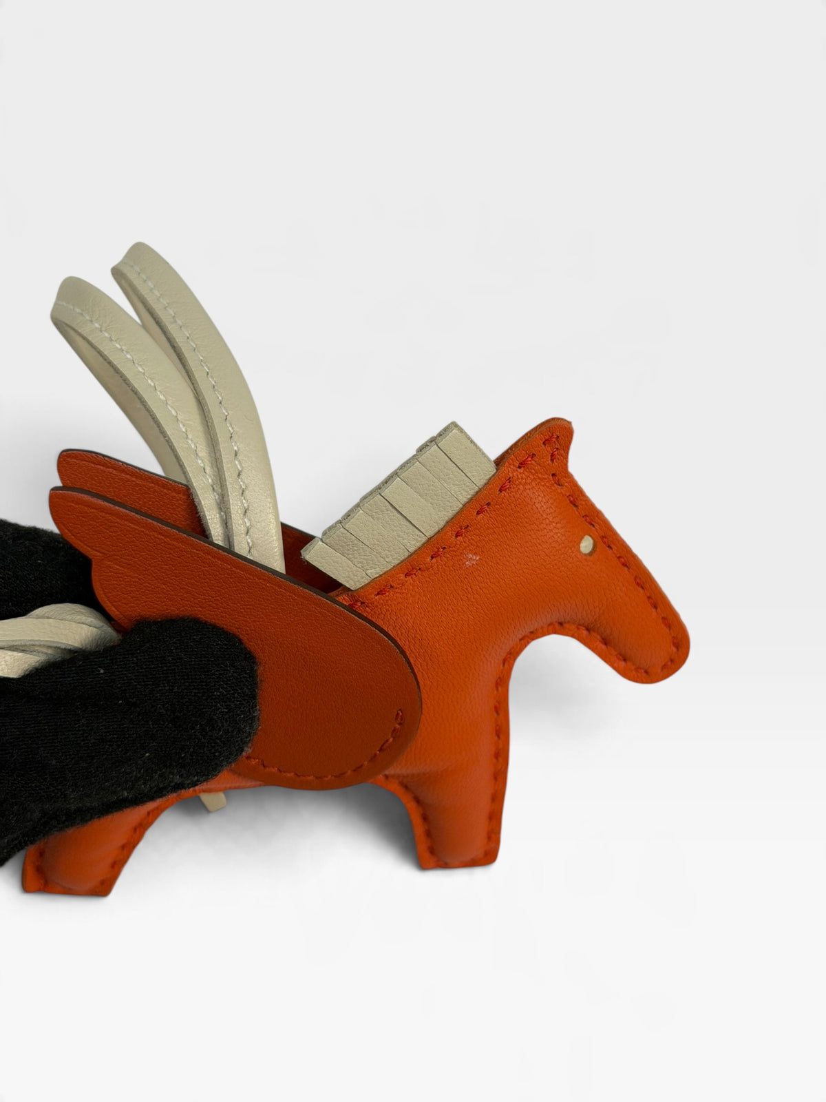 Hermès Rodeo Pegasus Charm In Orange Poppy, Craie & Terre Battue. 100% authentic and pre loved in excellent condition. 